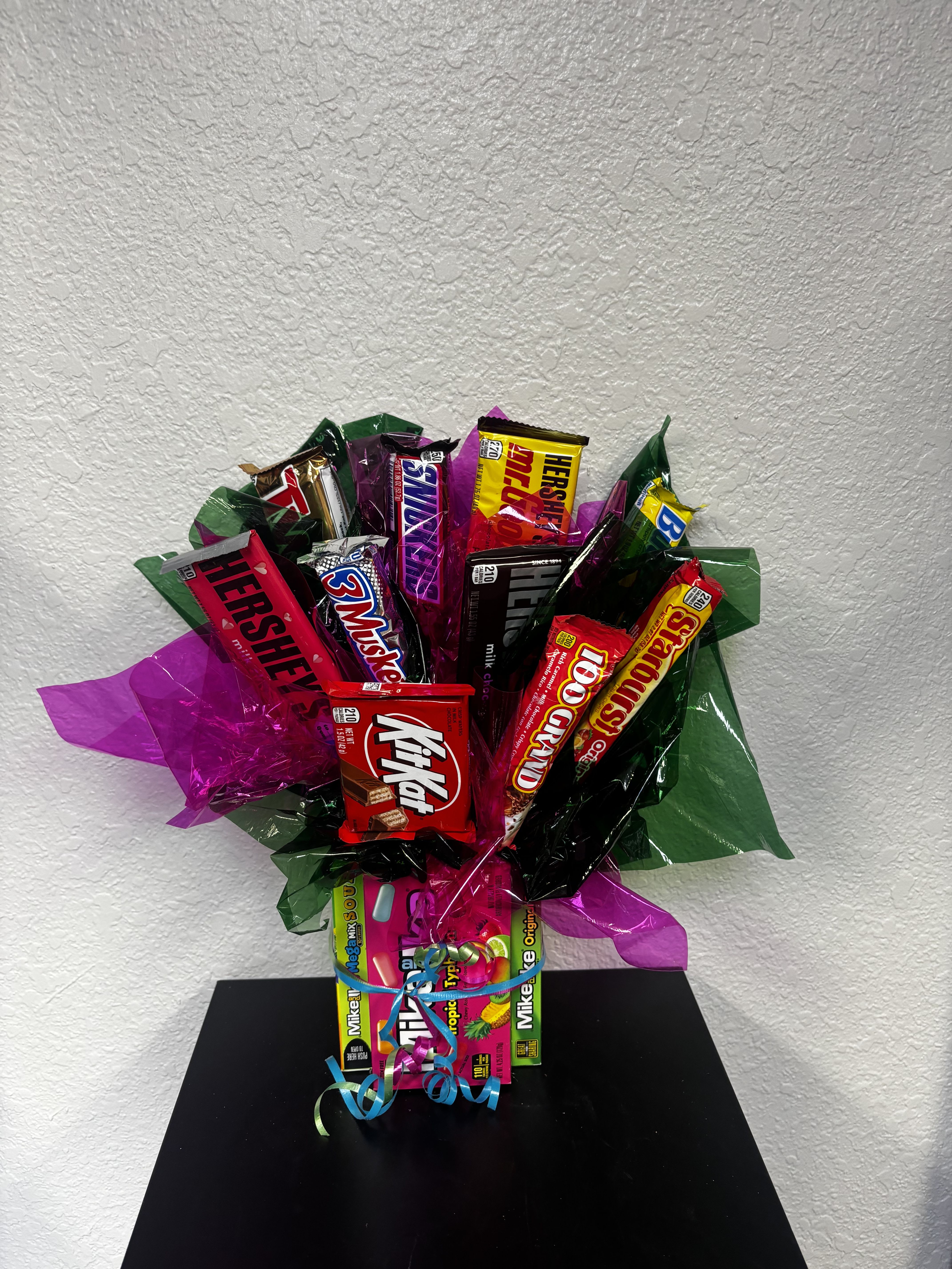 Bouquet of assorted candy bars wrapped in bright cellophane