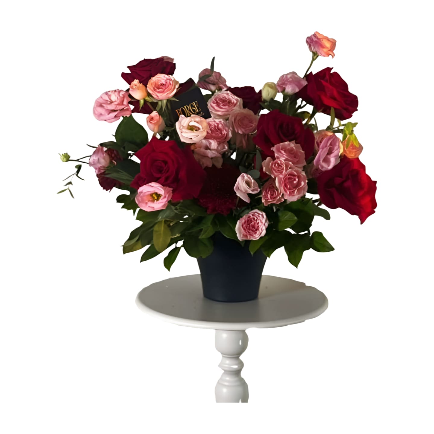 Midnight Rose - Deep red roses and soft pink blooms arranged in a sleek black pot. A bold yet romantic centerpiece that turns any table into a love story.