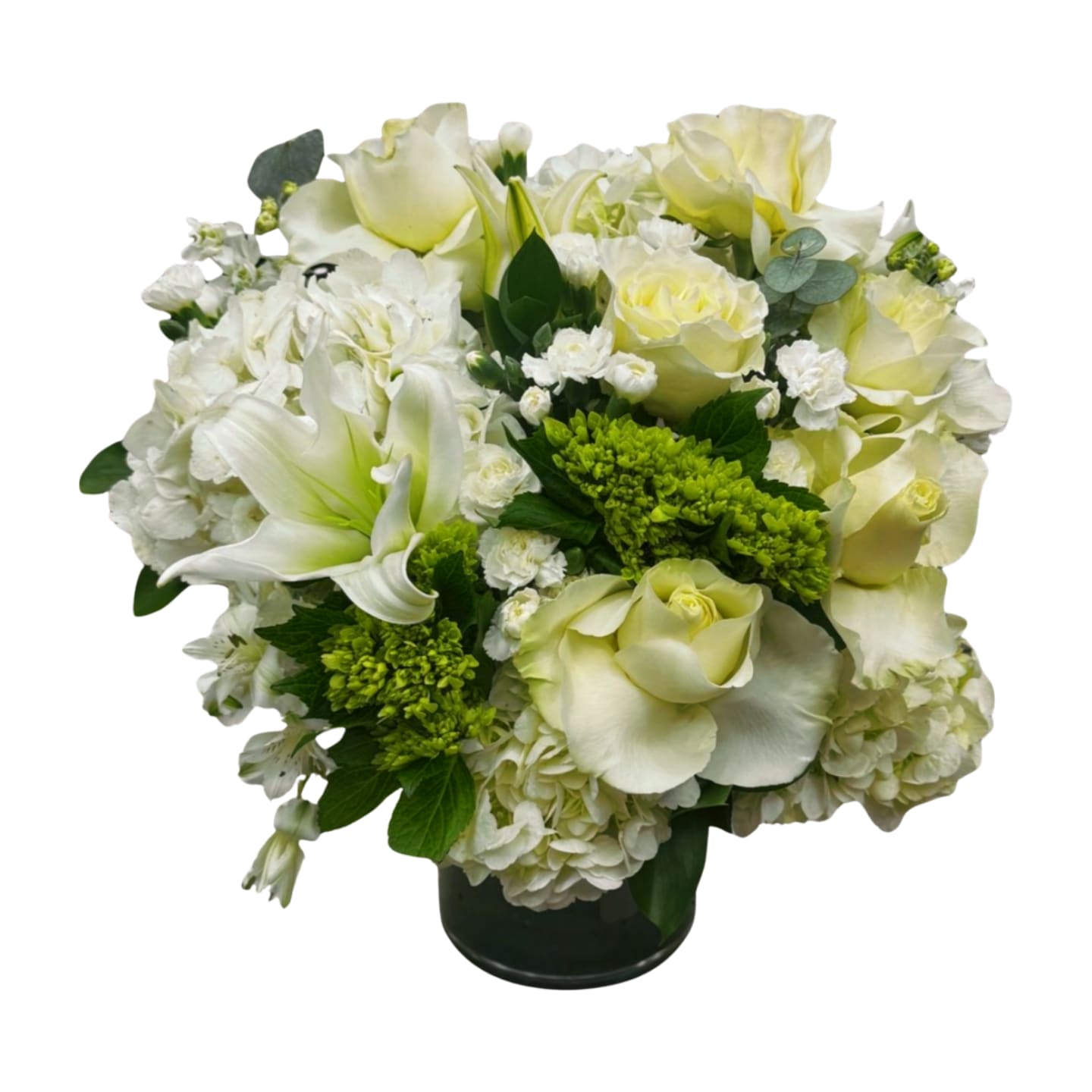 Serenity - A soft, timeless mix of white roses, lilies, hydrangea, and lush greenery, the definition of calm elegance. Perfect for expressing love, sympathy, or just bringing peace to any space.