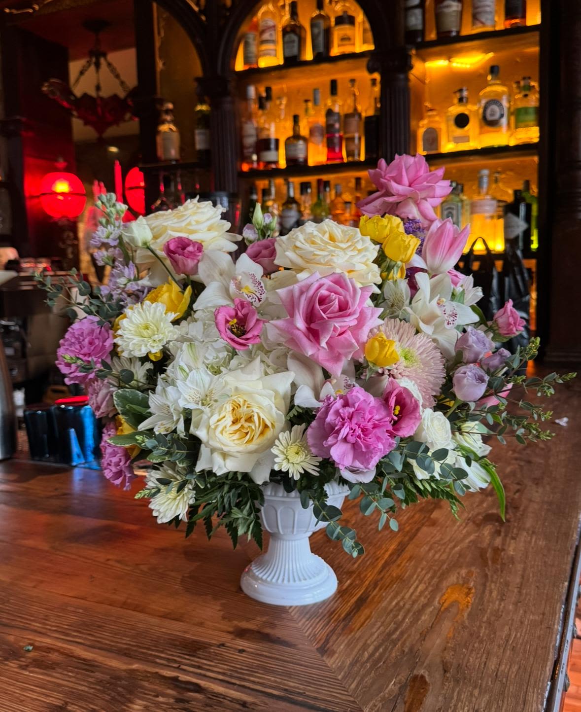 Endless Summer arrangement- Hydrengeas, garden roses, stock, orchid - Beautiful mix of colorful florals in urn. Perfect as a gift or an event centerpiece!