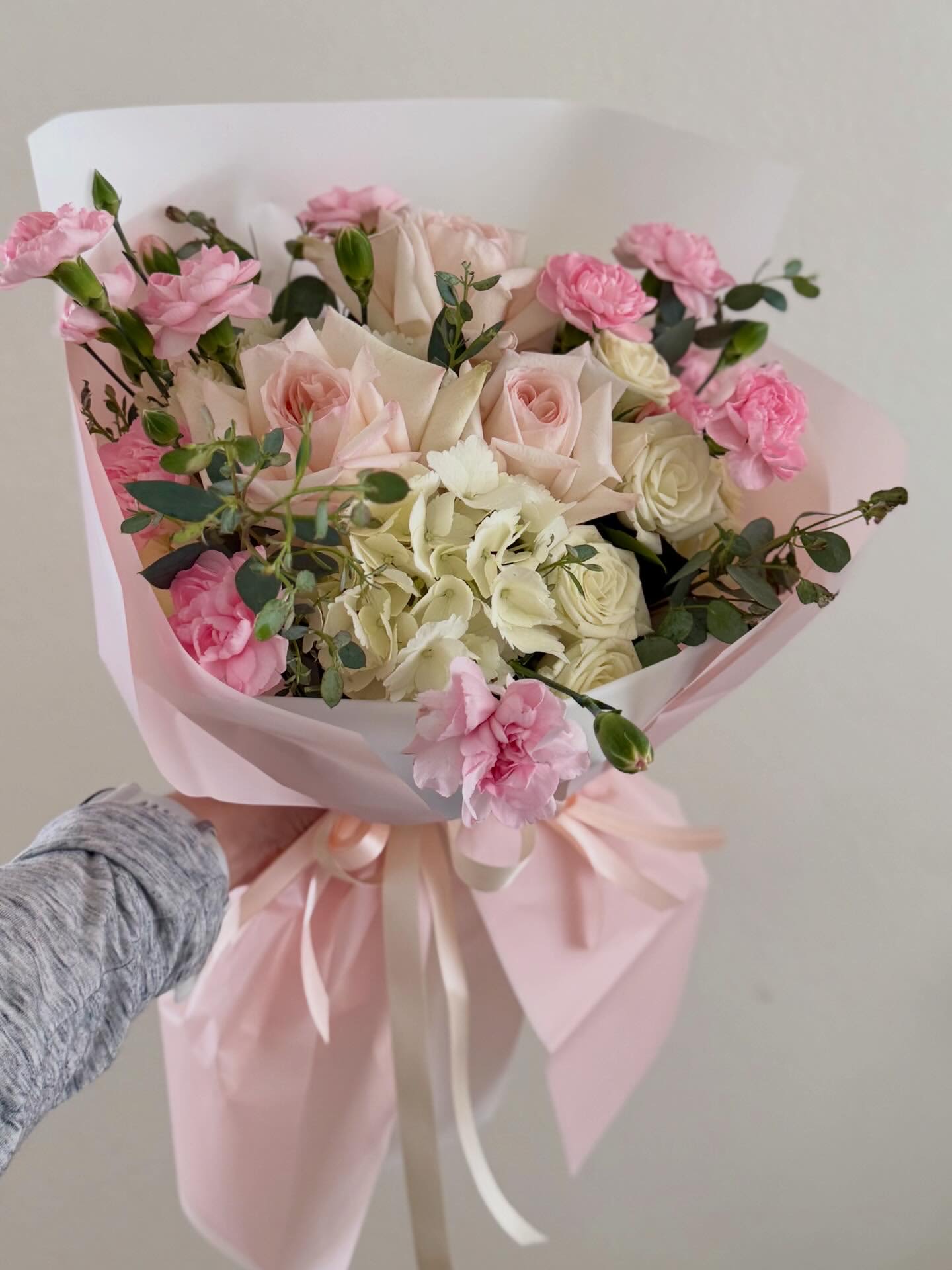 Designer's choice  - A soft and delicate bouquet in gentle pastel tones, thoughtfully arranged by our florist.