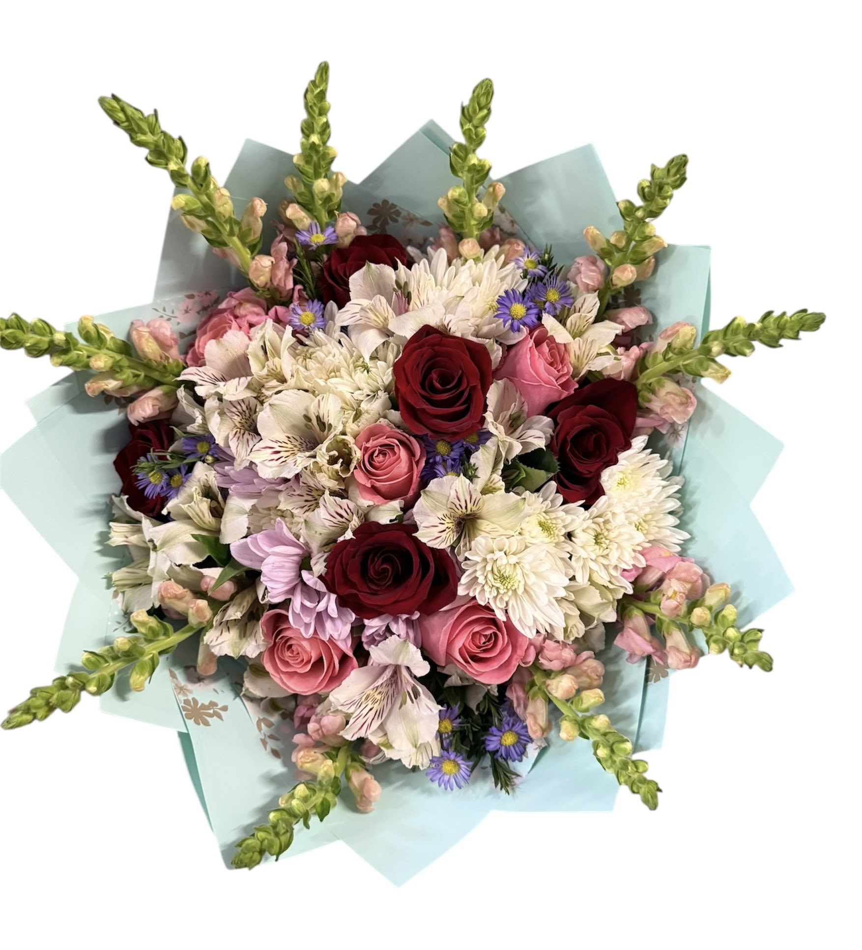 Bouquet of pink and burgundy roses with white daisies and purple accents