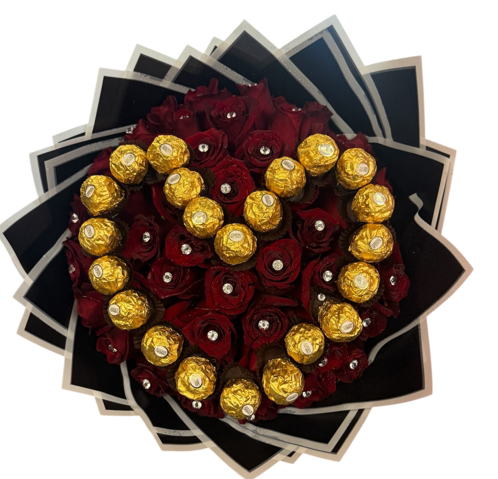 Bouquet of red roses with gold-wrapped chocolates and black paper
