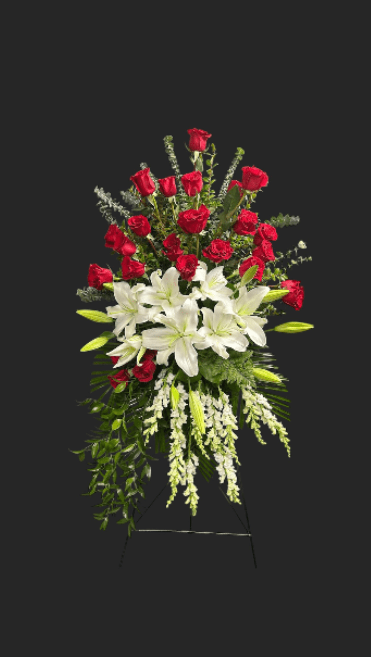 Love and Comfort Spray - Red roses and white lily standing spray with snapdragons.