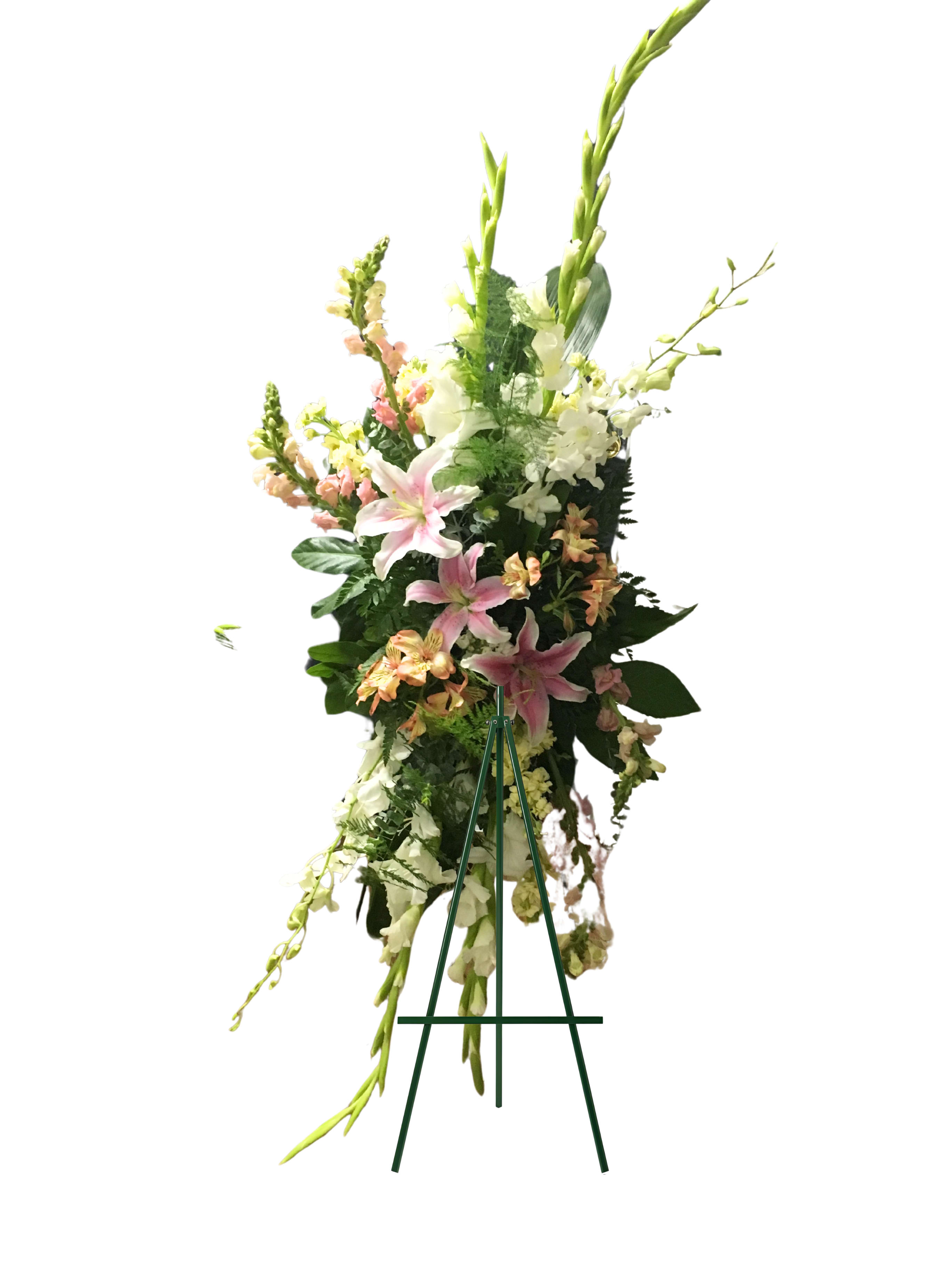 Tall floral standing spray with pink lilies and white blossoms on an easel