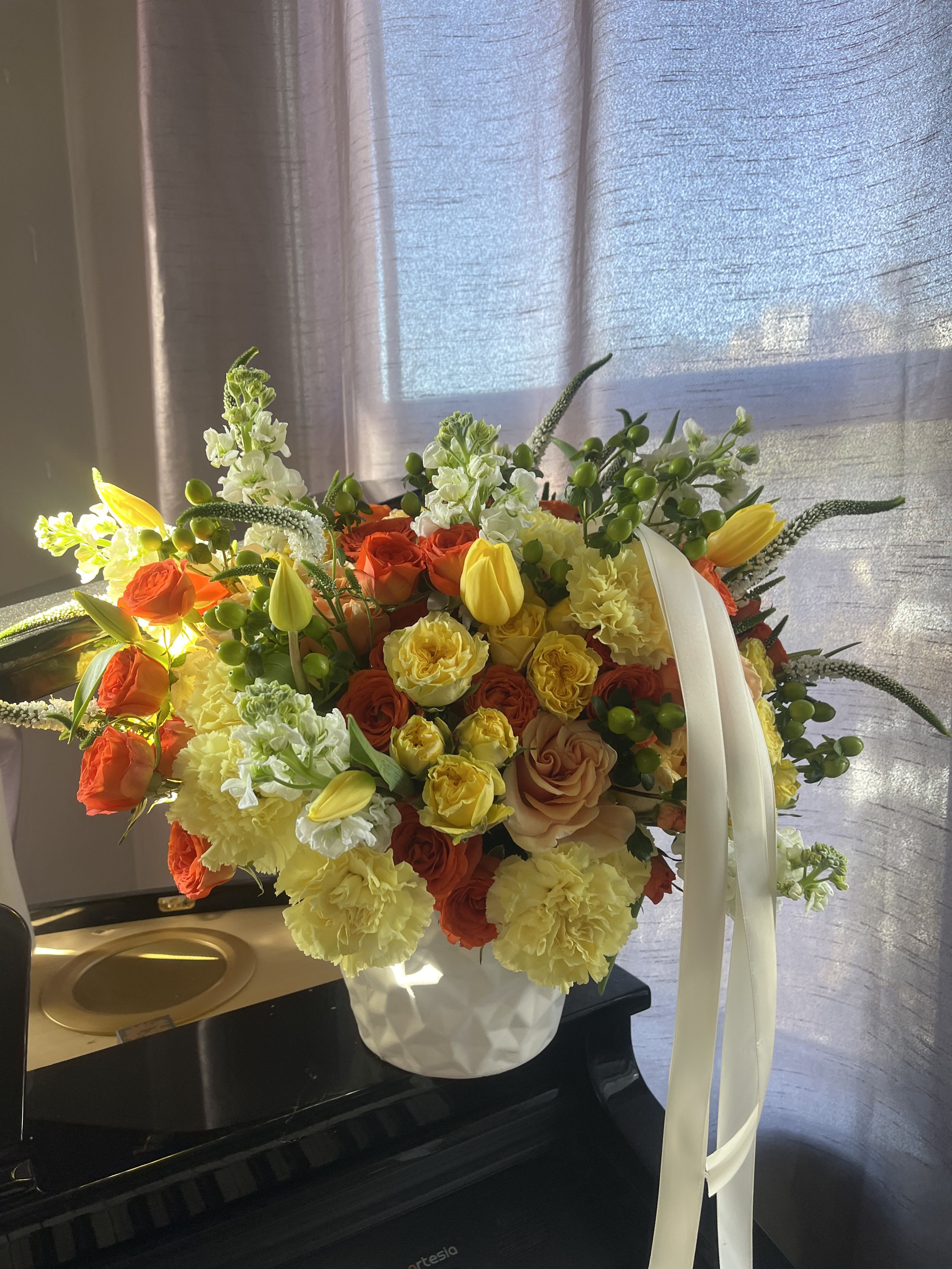 Sunset Vibes  - Beautiful garden roses and tulips makes this arrangement a perfect gift to brighten someones day. 
