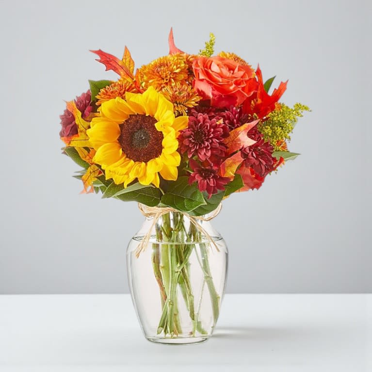 Golden Horizon Bouquet - Brighten any moment with the Golden Horizon Bouquet, a radiant mix of sunflowers, roses, lilies, and solidago.