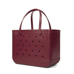 Bogg Bag Original - Mulled Wine - The bag that started it all—washable, indestructible, and built to carry it all. The Original Bogg Bag is our largest, most spacious tote—perfect for beach days, big hauls, and everyday family adventures.  Durable and tip-proof, it stands upright, wipes clean, and keeps up with whatever your day throws at it. Sand brushes off. Spills don’t stick.  Includes two clear insert bags—perfect for organizing smaller essentials like your phone, sunscreen, keys, or snacks.  Pair it with our full line of Bogg accessories—dividers, toppers, coolers, makeup bags, and more—to build your ultimate carryall kit.  Best for: Beach trips, travel days, family outings, and everything in between.