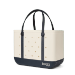 Bogg Bag Original - Oxford Blue - The bag that started it all—washable, indestructible, and built to carry it all. The Original Bogg Bag is our largest, most spacious tote—perfect for beach days, big hauls, and everyday family adventures.  Durable and tip-proof, it stands upright, wipes clean, and keeps up with whatever your day throws at it. Sand brushes off. Spills don’t stick.  Includes two clear insert bags—perfect for organizing smaller essentials like your phone, sunscreen, keys, or snacks.  Pair it with our full line of Bogg accessories—dividers, toppers, coolers, makeup bags, and more—to build your ultimate carryall kit.  Best for: Beach trips, travel days, family outings, and everything in between.