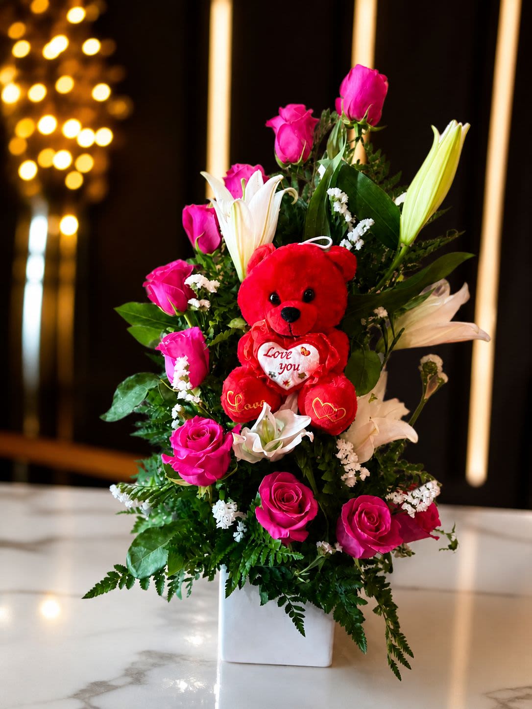 Velvet Elegance Arrangement in a Vase - Velvet Elegance With 12 Roses Hot Pink  And Lilies 