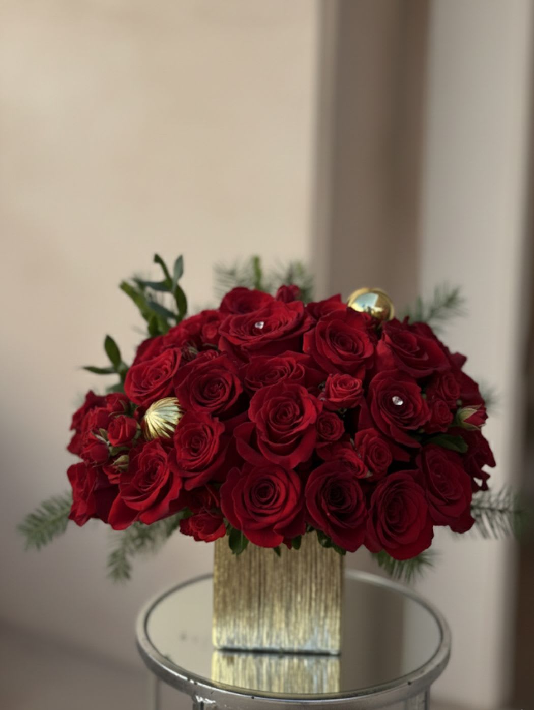 Christmas Arrangement by Ritsa Flowers  - Elegant roses, festive greens, and holiday charm — handcrafted with love. Make your celebrations extra special with fresh, elegant blooms design.