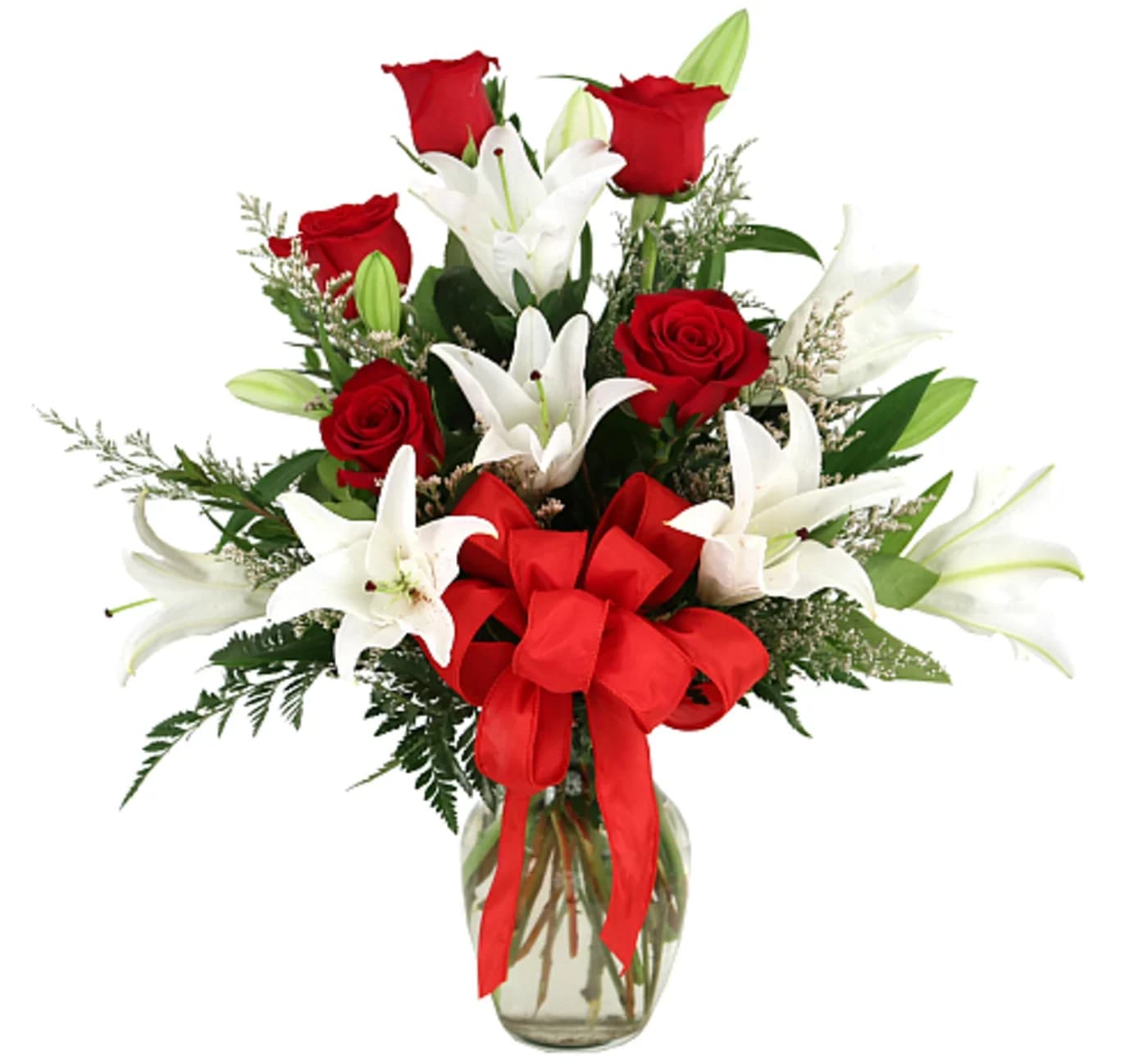 Bouquet of red roses and white lilies in a glass vase with a red ribbon