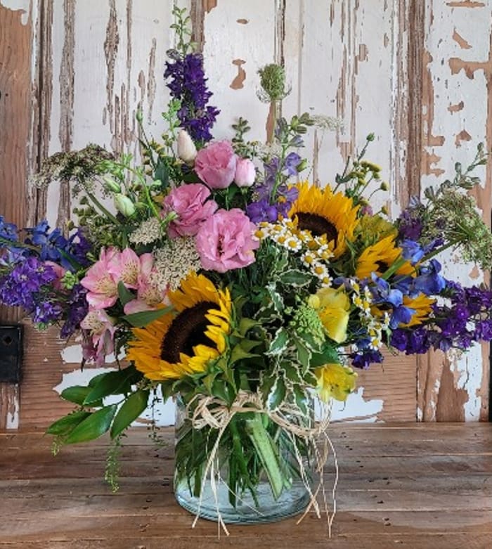 Thinking of You Blooms - The go-to arrangement, that's simple and shows that you are thinking of someone. Bright and cheerful includes Sunflowers, Lisianthus and so much more!