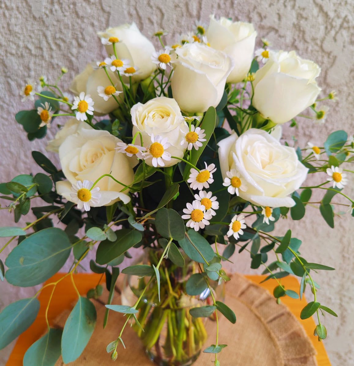 Retro Rose - Clean, classic, and effortlessly charming, Retro Daisy &amp; Rose brings a timeless garden feel to any space. Crisp white roses pair beautifully with cheerful white daisies, creating a fresh arrangement that feels both nostalgic and modern. With soft textures and bright petals, this bouquet captures the carefree spirit of vintage flower power while keeping things elegant and simple.  Light, airy, and full of natural charm, Retro Daisy &amp; Rose is perfect for celebrating life’s sweet moments, brightening a room, or sending a little happiness just because.