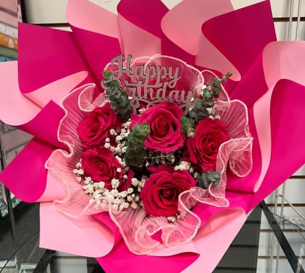 Bouquet of pink roses with a Happy Birthday topper