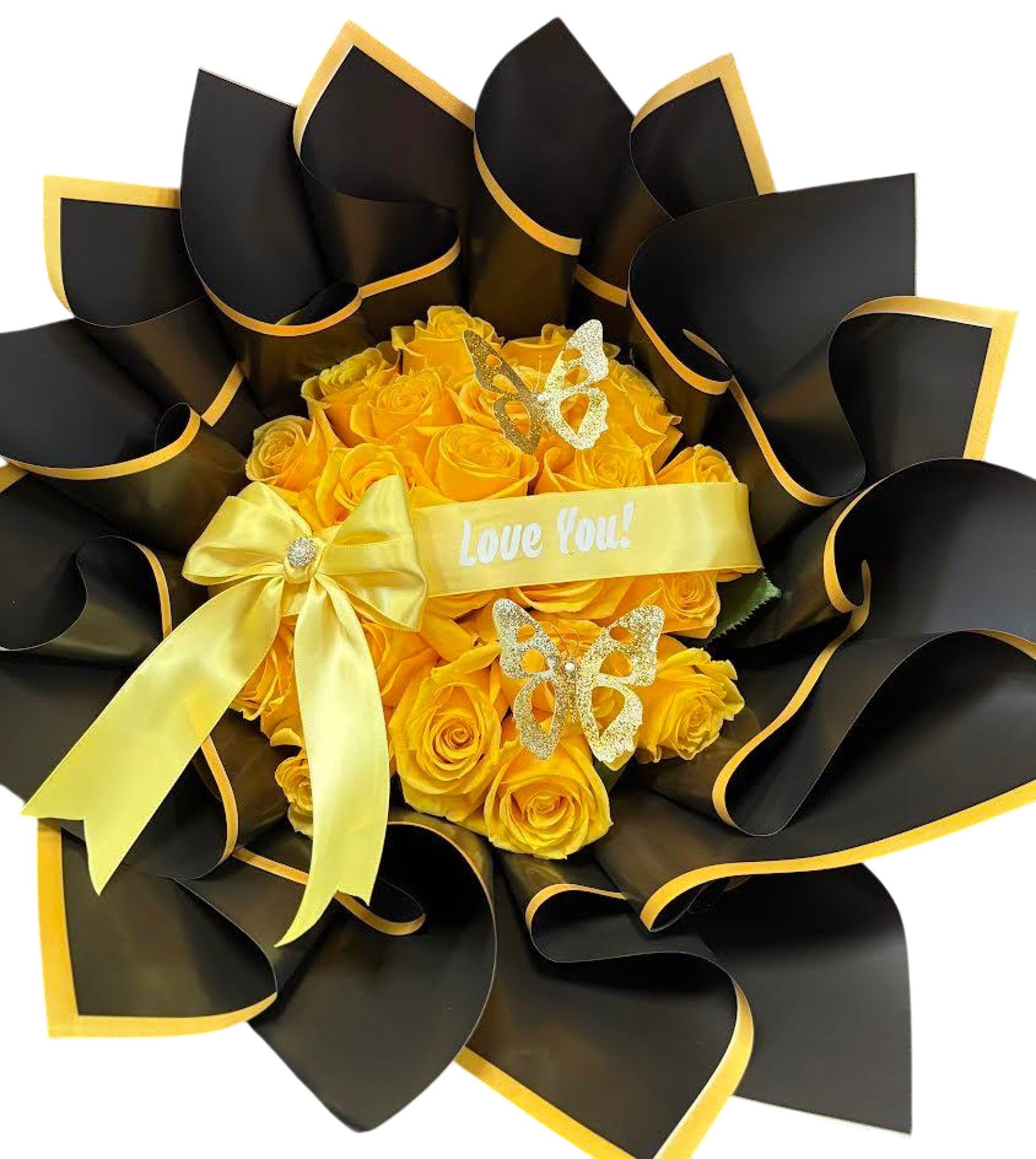 Yellow rose bouquet wrapped in black paper with a ribbon and butterfly decorations