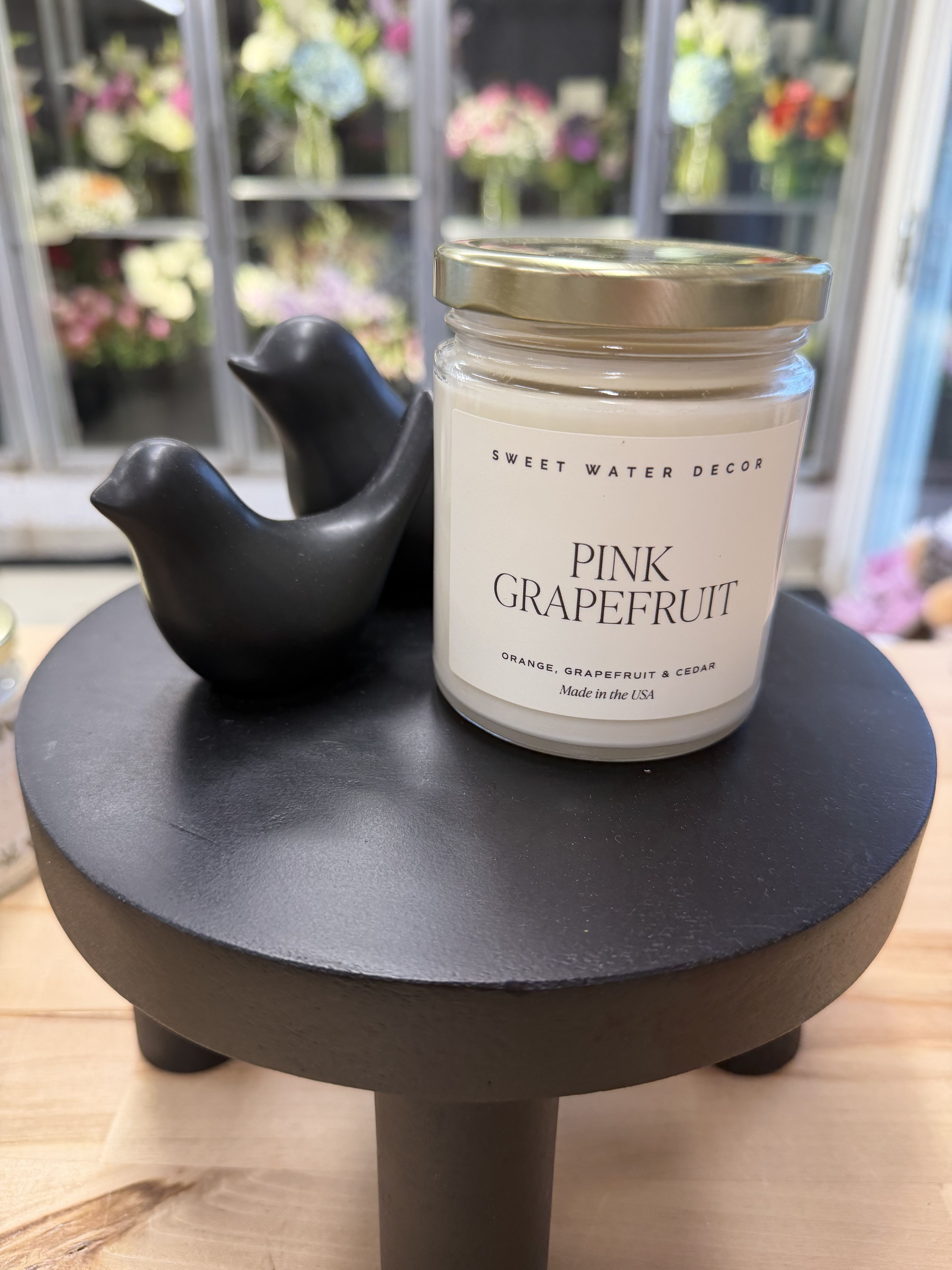 Candle - Pink Grapefruit - Pink Grapefruit scent will refresh any space. Sweet scent notes of grapefruit, orange, and cedar combined with other calming scents are a summer staple.