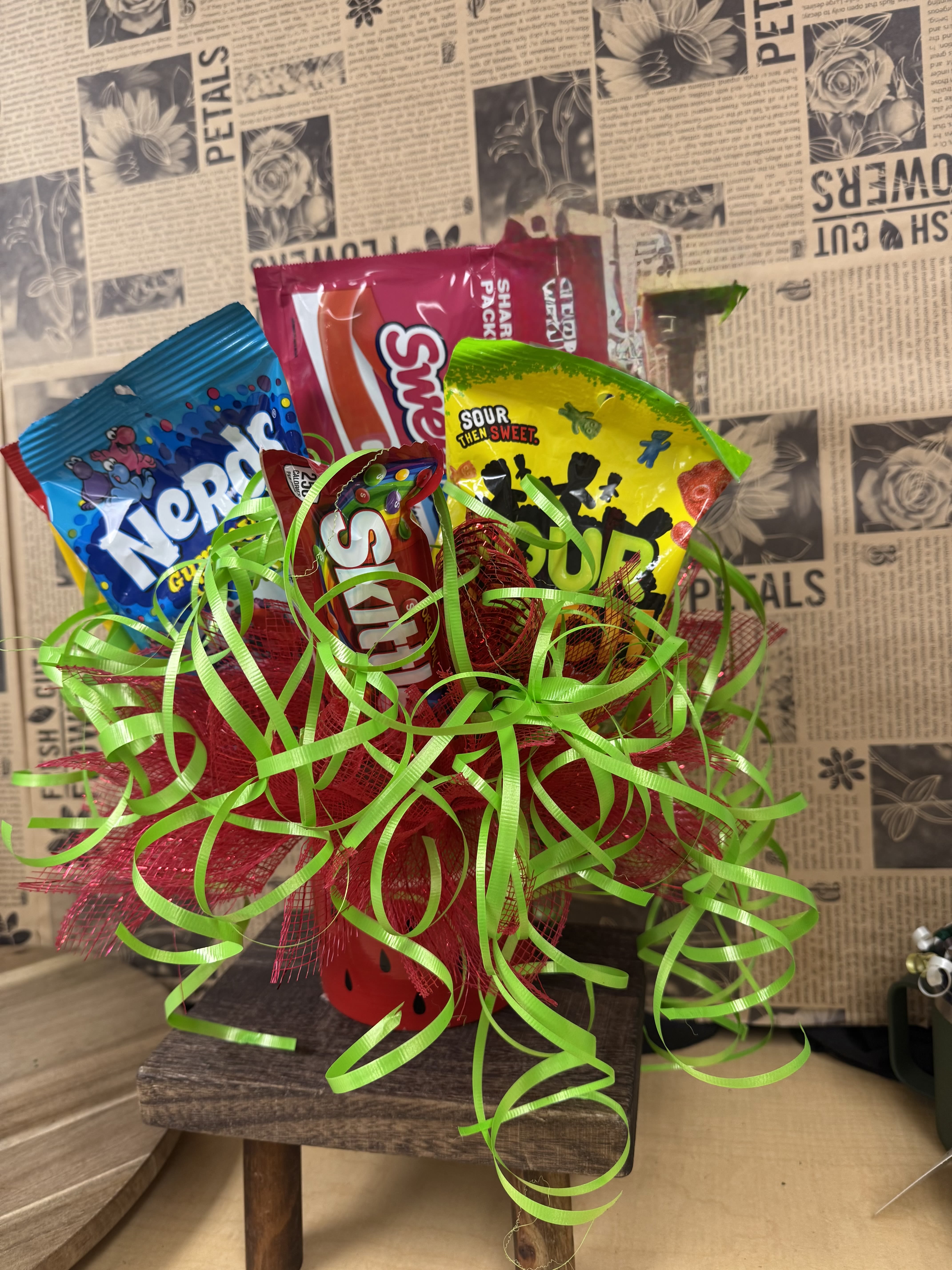 Candy bouquet with assorted snack bags and bright ribbon curls