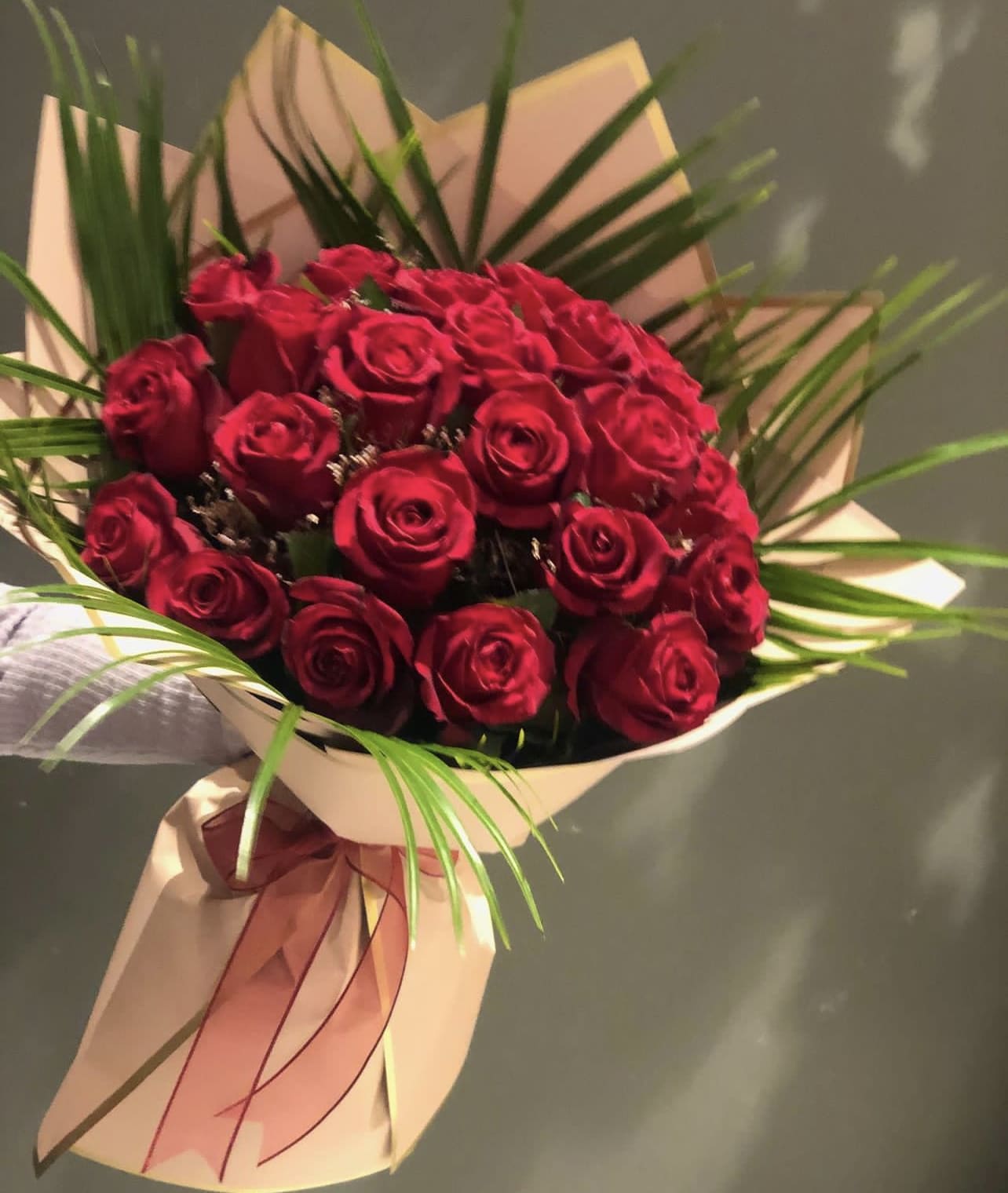 Show Your Love Hand Bouquet - 25roses - DESCRIPTION: BOUQUETS NEVER EVER are identical, they come out different every time please keep this in mind! your bouquet will have similar flowers, similar colors and similar theme :-)  if youd like to customize your rose color or wrapping color please give us a call and we will give you alot more options over the phone! 937-689-6325  Note: Hand bouquets do not include a vase. 