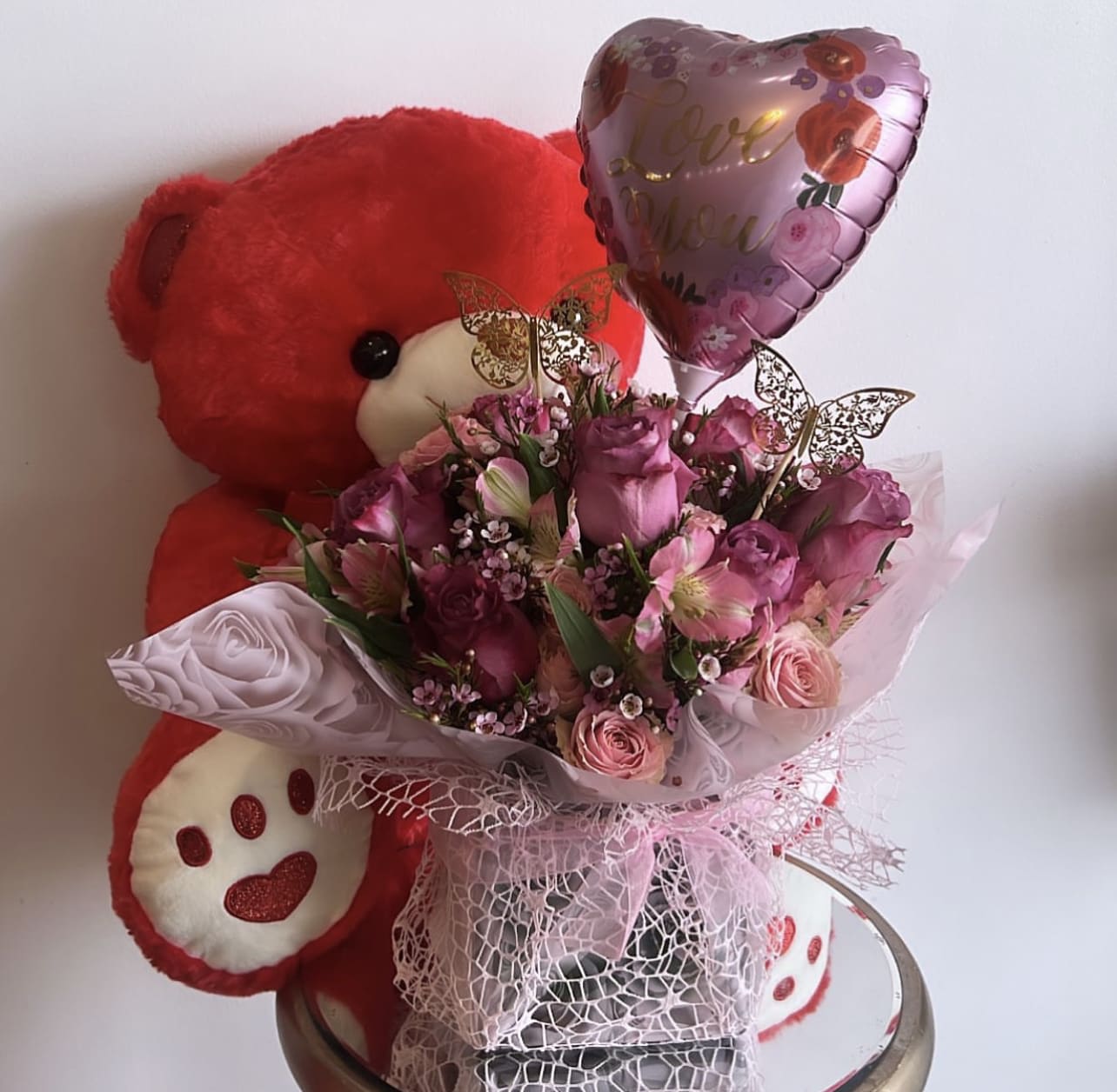 Simply Divine Bouquet  - Yes, divine is the perfect way to describe this incredibly beautiful combination of multi-pink roses coupled with pink alstroemeria and pink waxflower in a glass cube vase accented with Ti Leaf ribbon.