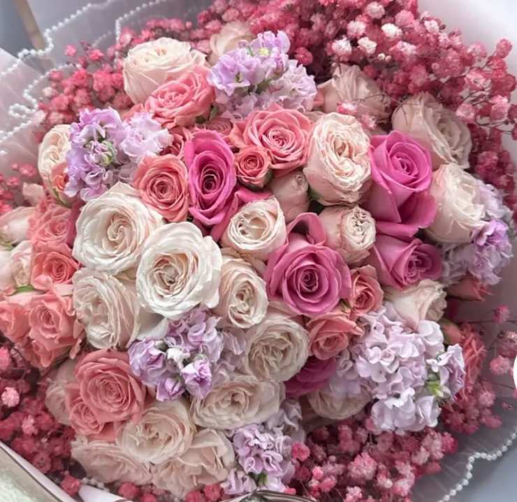 Pink and white rose bouquet with lavender accents