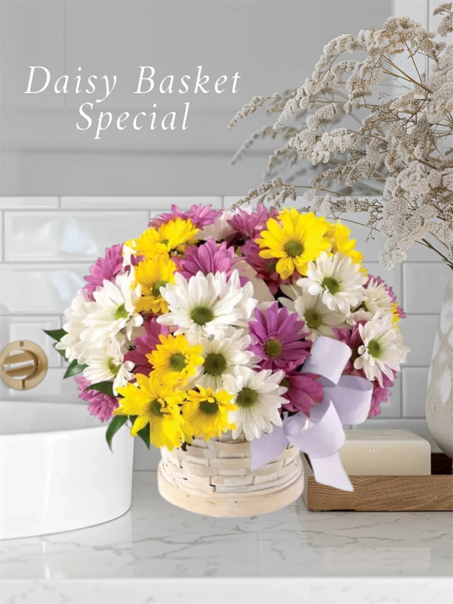 Basket of white, yellow, and purple daisies with a lavender ribbon