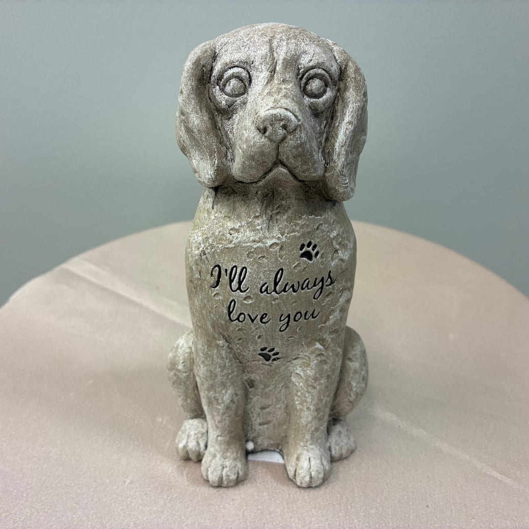 Stone dog figurine with the words "I'll always love you" on its chest