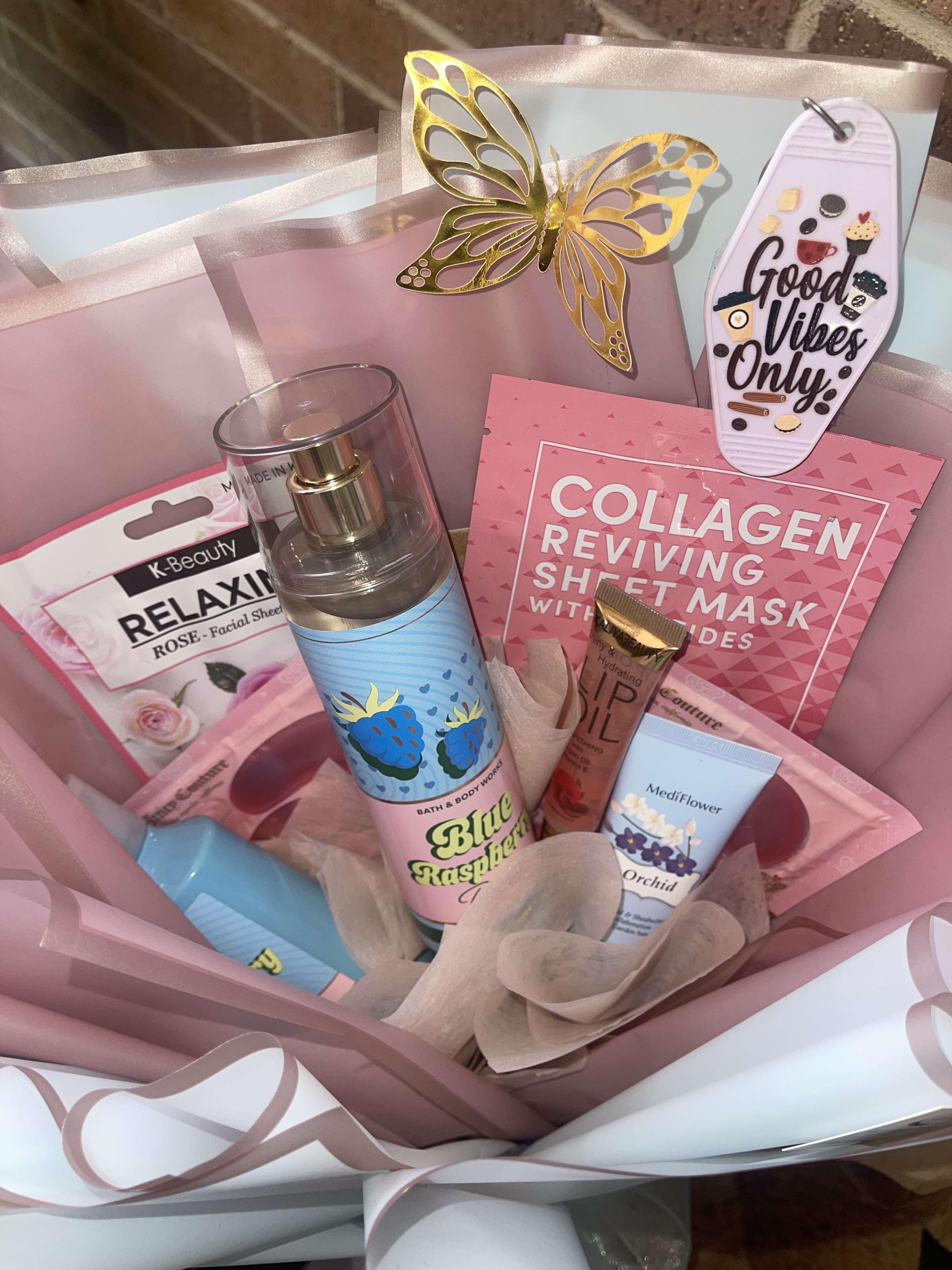 Gift basket with skincare items and a butterfly topper