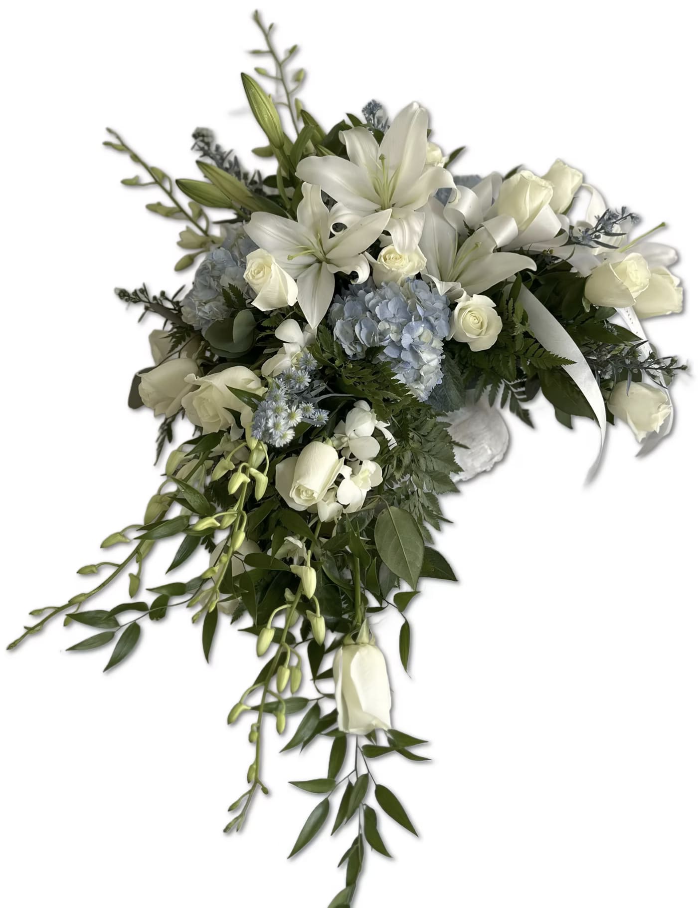 US9 - Website Cascading Urn Spray - Flowers and containers are subject to substitution and availability.