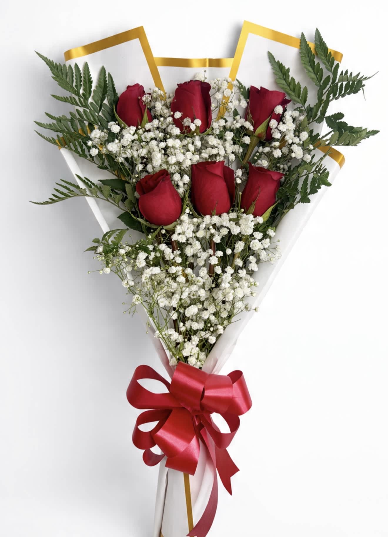 Bouquet of red roses and white baby's breath with a red ribbon