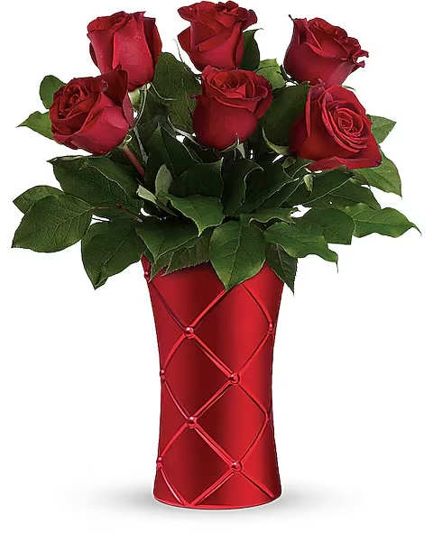 Red roses arranged in a red vase