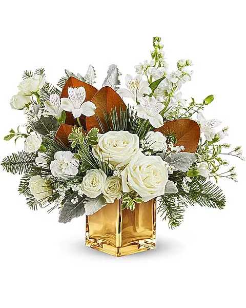 White roses and white blooms arranged in a gold vase