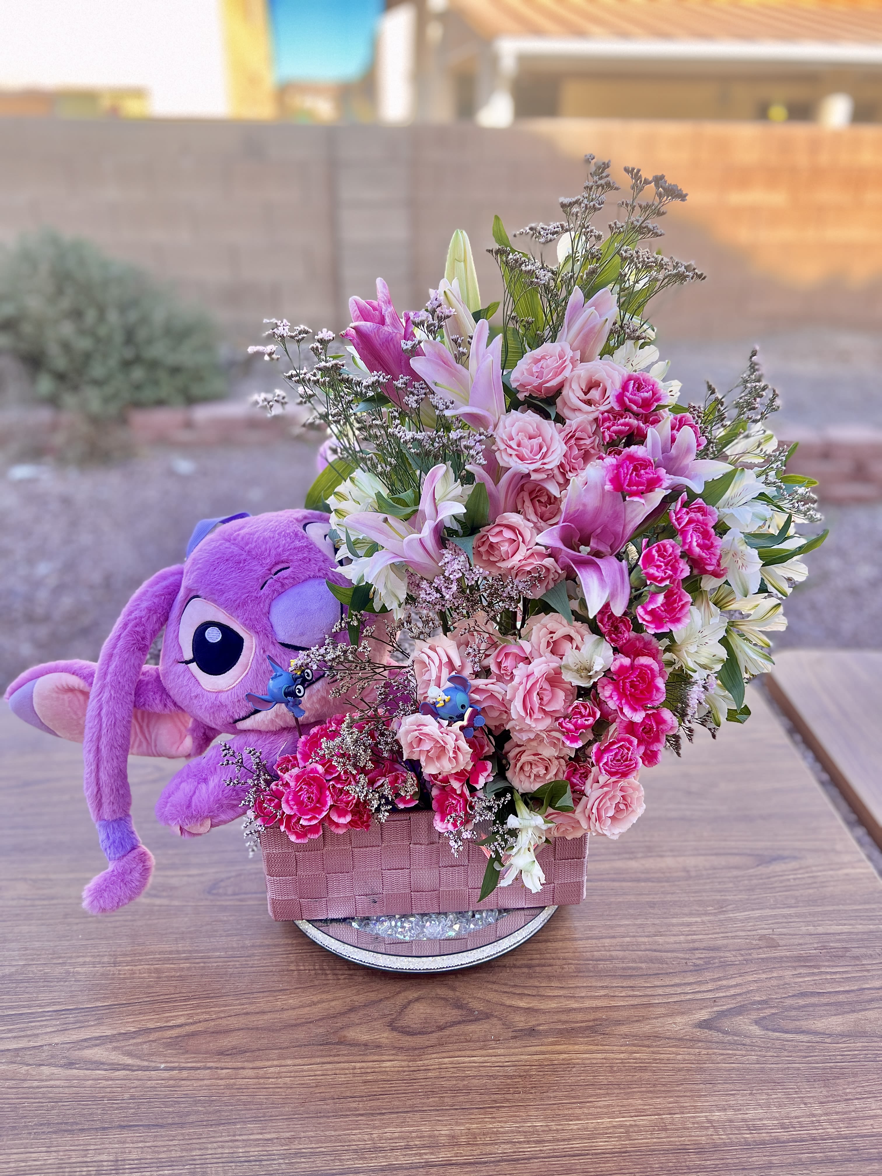 Plushy Arrangement - Beautiful flower arrangement with a cute plushy.