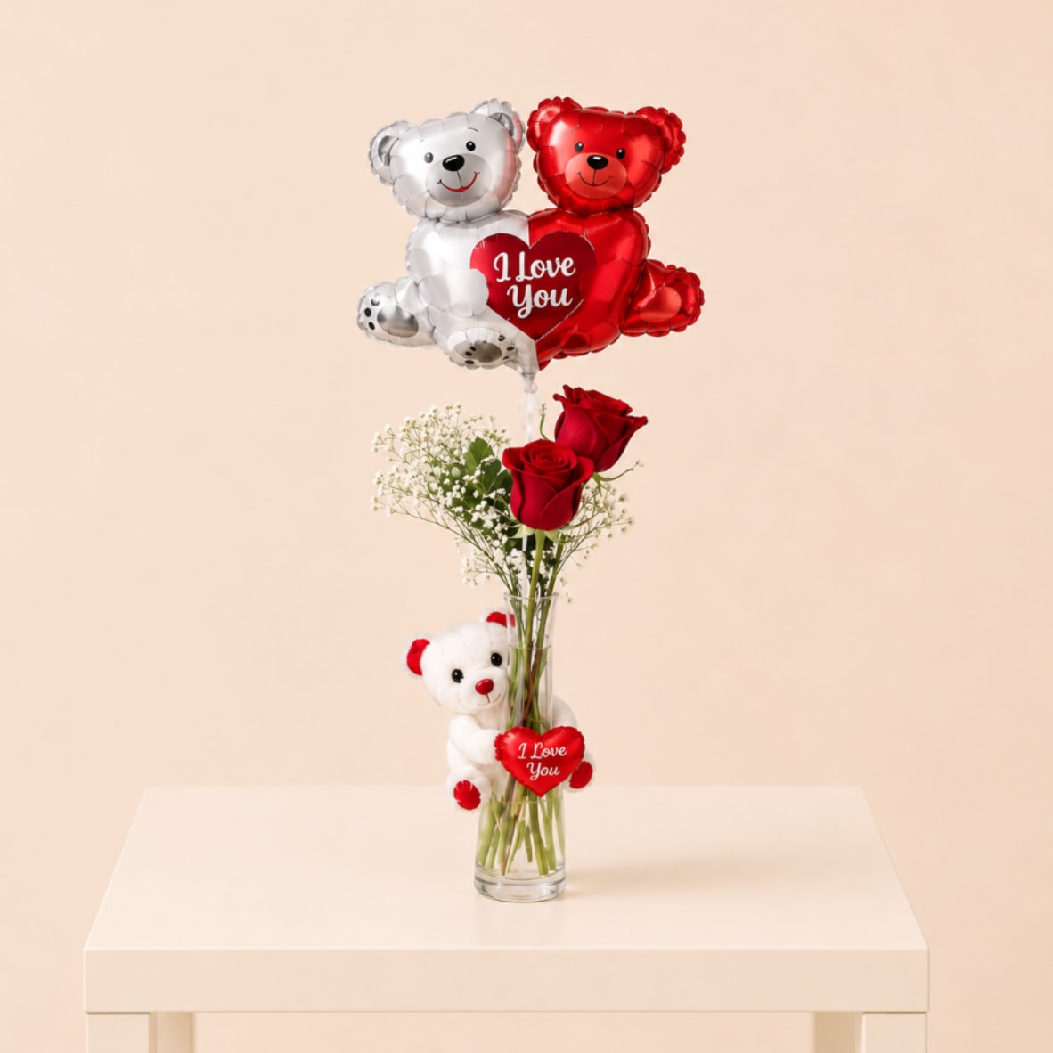 Love You Always - A romantic floral gift featuring fresh red roses, beautifully arranged with a soft plush teddy and a charming teddy bear balloon in a clear glass vase. Sweet, thoughtful, and full of love, this design is the perfect way to say “I love you” and create a memorable surprise.  Perfect for: Valentine’s Day, anniversaries, birthdays, romantic gestures, or a heartfelt “just because” surprise.  Available for local flower delivery throughout Naples, Bonita Springs, Estero, Fort Myers and Fort Myers Beach.  Designer’s Choice: Each arrangement is uniquely designed using the freshest seasonal flowers available. Flower varieties, colors and containers may vary while maintaining the overall style, value and beauty of the design.
