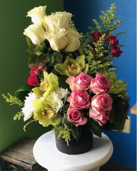 Love Conquers All - great way to make smile with an extraordinary bouquet, great for any occasion.