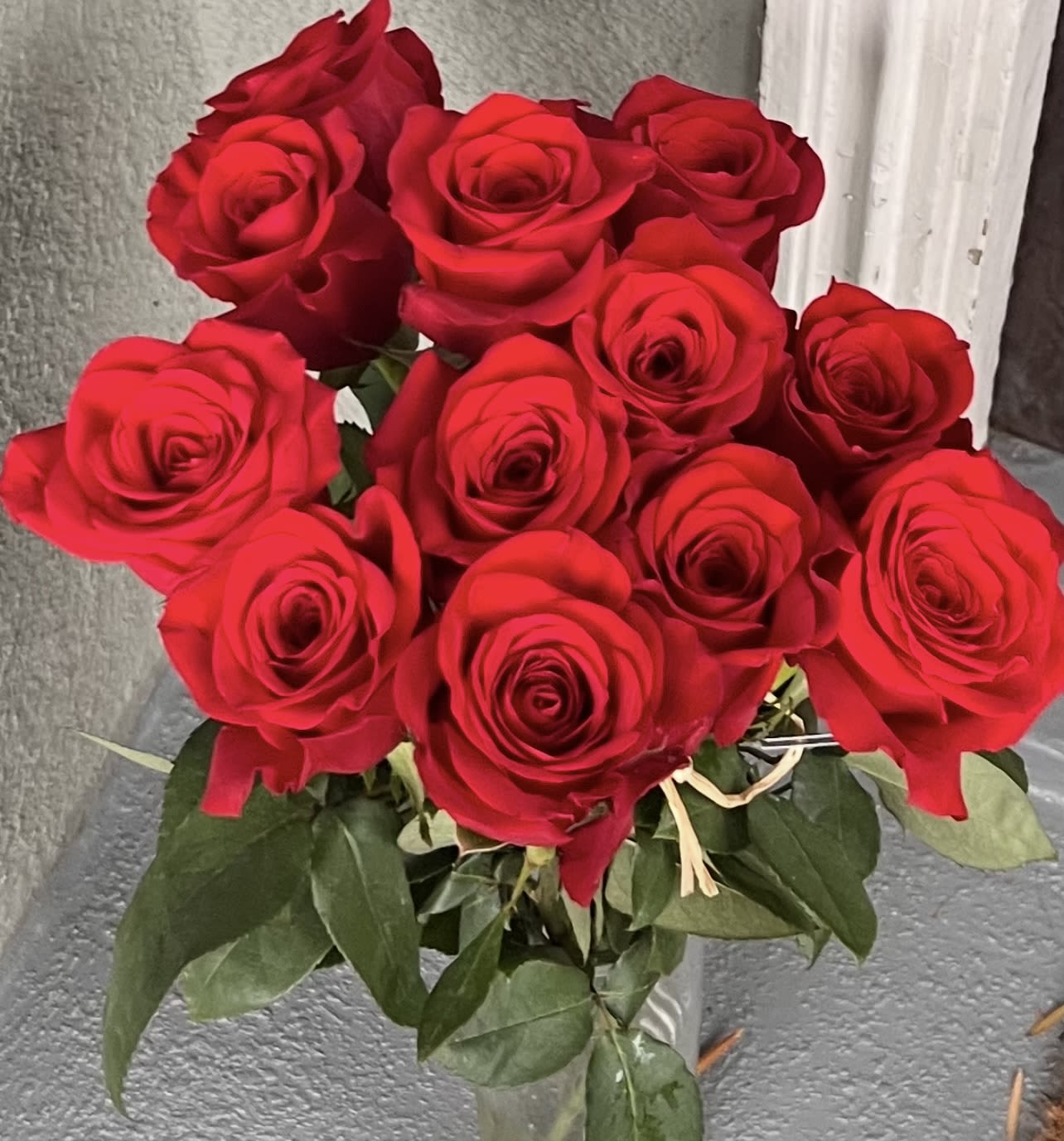 Love, Gathered by Hand - Twelve radiant red roses, arranged with care and intention. Inspired by the magic of gathering wildflowers, this bouquet brings a touch of nostalgia and cinematic romance — where every petal feels like a heartbeat and every stem tells a story. 