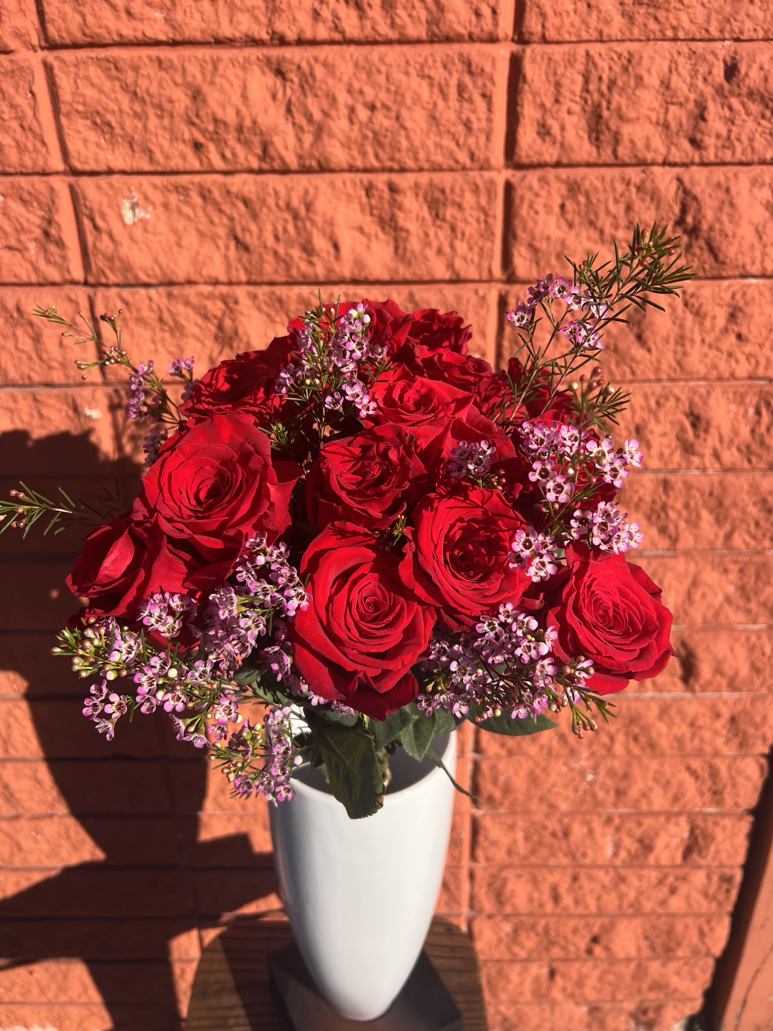 Be my Valentine  - Celebrate love with our enchanting *Be My Valentine* bouquet, a stunning arrangement that speaks the language of the heart. This exquisite collection features a premium red roses, each symbolizing deep affection and passion. Handcrafted with care, these roses are beautifully complemented by delicate filler flowers, creating a romantic and elegant display. Perfect for Valentine's Day, anniversaries, or any occasion where you want to express your heartfelt emotions, the *Be My Valentine* bouquet is a timeless gift that promises to leave a lasting impression. Let your loved one know just how special they are with this breathtaking floral expression of love.