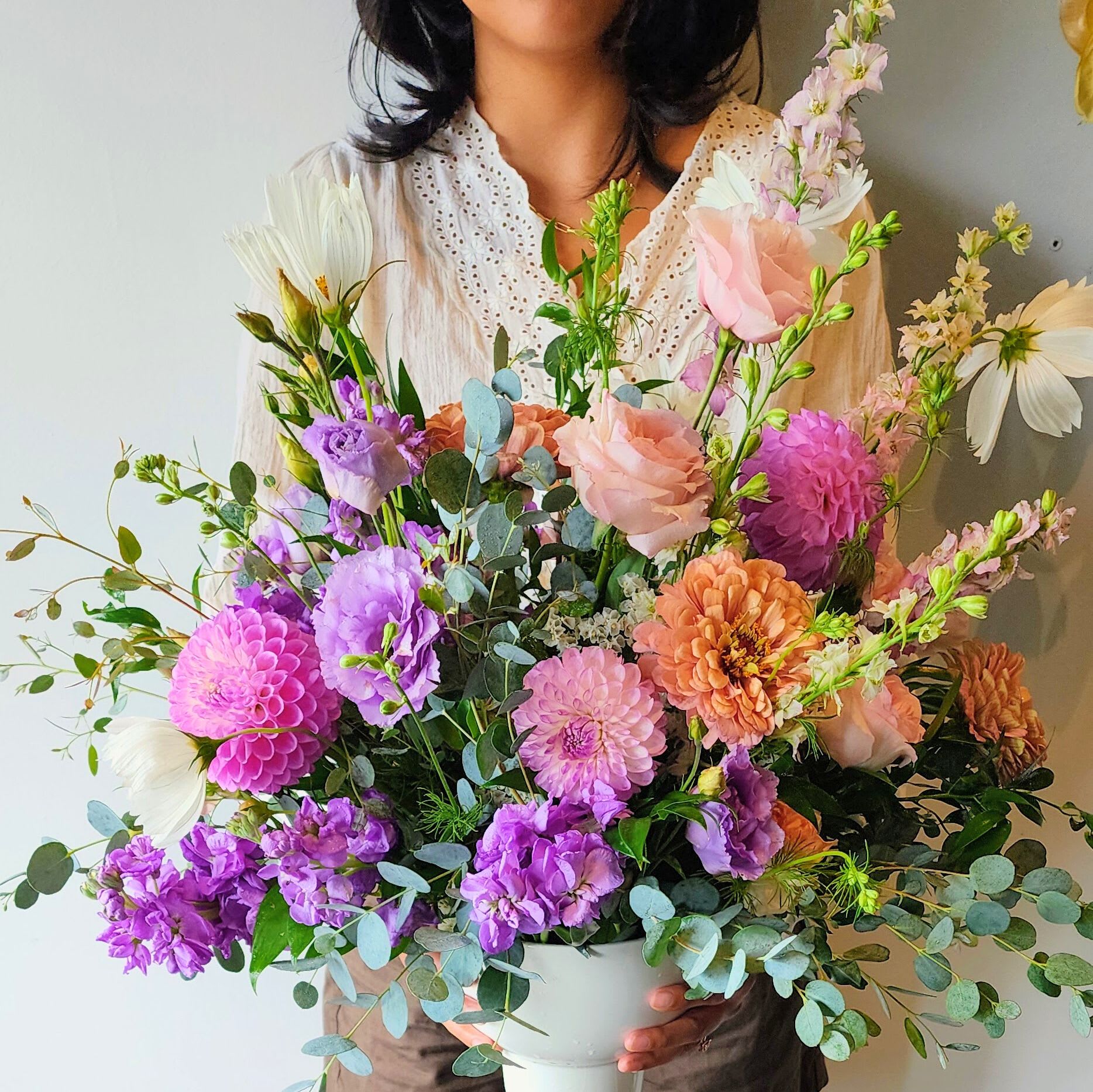 Extra Large Flower Arrangement-whimsical garden - Beautiful, modern and unforgettable floral artistry! This is our largest arrangement from our ceramic series and is the most impressive. This arrangement comes in beautiful pastel color palette. We choose the freshest and prettiest flowers in season. This arrangement displayed in a foyer or on a dining room table is the perfect welcoming addition.   *Flowers and vases are natural and artisan products, and no two arrangements are exactly alike. While your arrangement may differ slightly from the photo, it will be designed with the same style and color palette of your choice. Occasionally, substitutions of vases may be necessary due to market availability, but we will always substitute with a vase of equal or greater value.