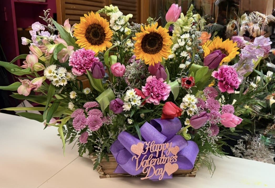 Ray of sunshine - Sunflowers, stock, carnations and tulips. Colors may vary 