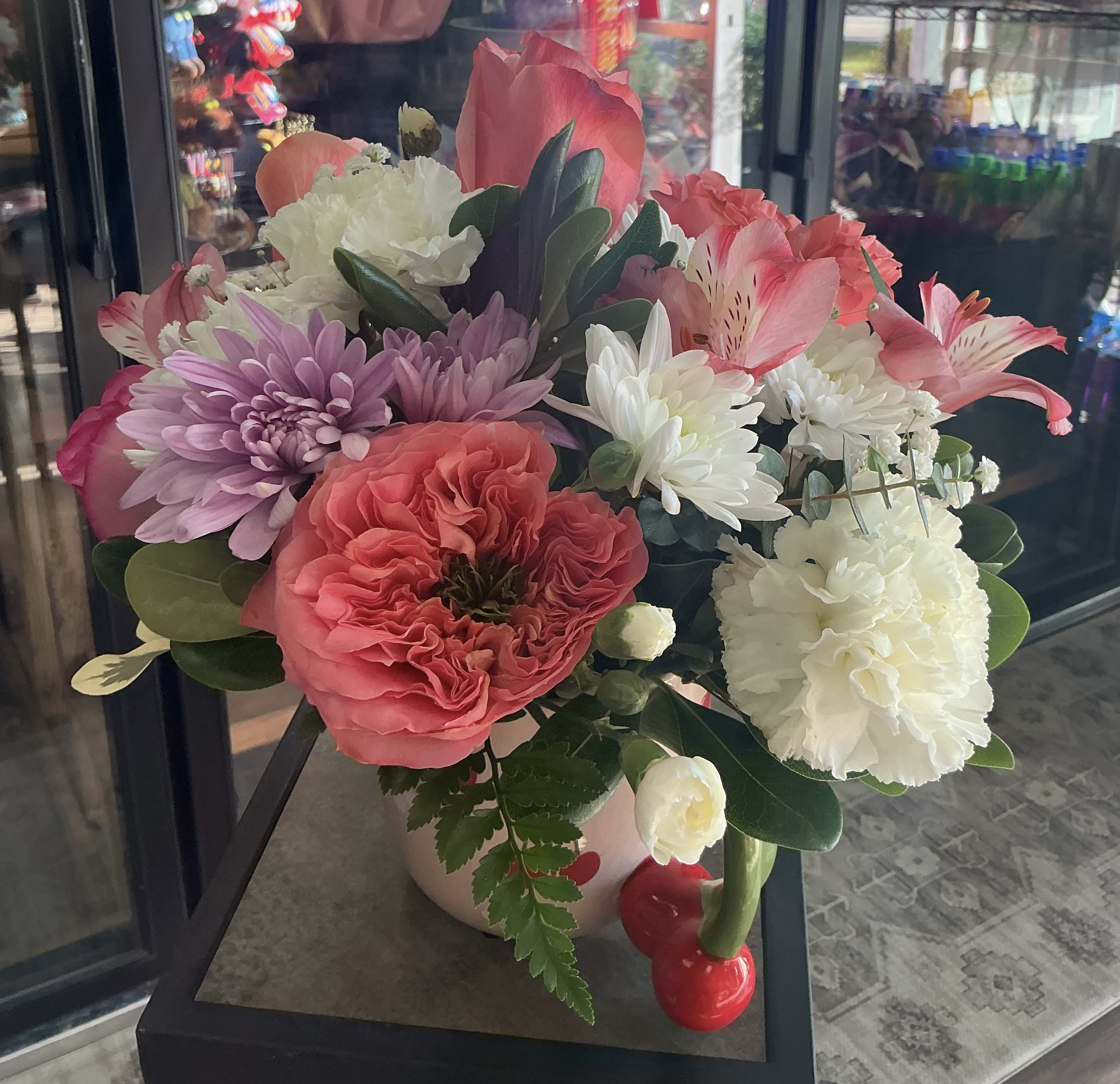 Cherry  - This cute and elegant bouquet is a simple way to say i love you ,just made of roses ,carnation ,mini carnation , greens , and much more 