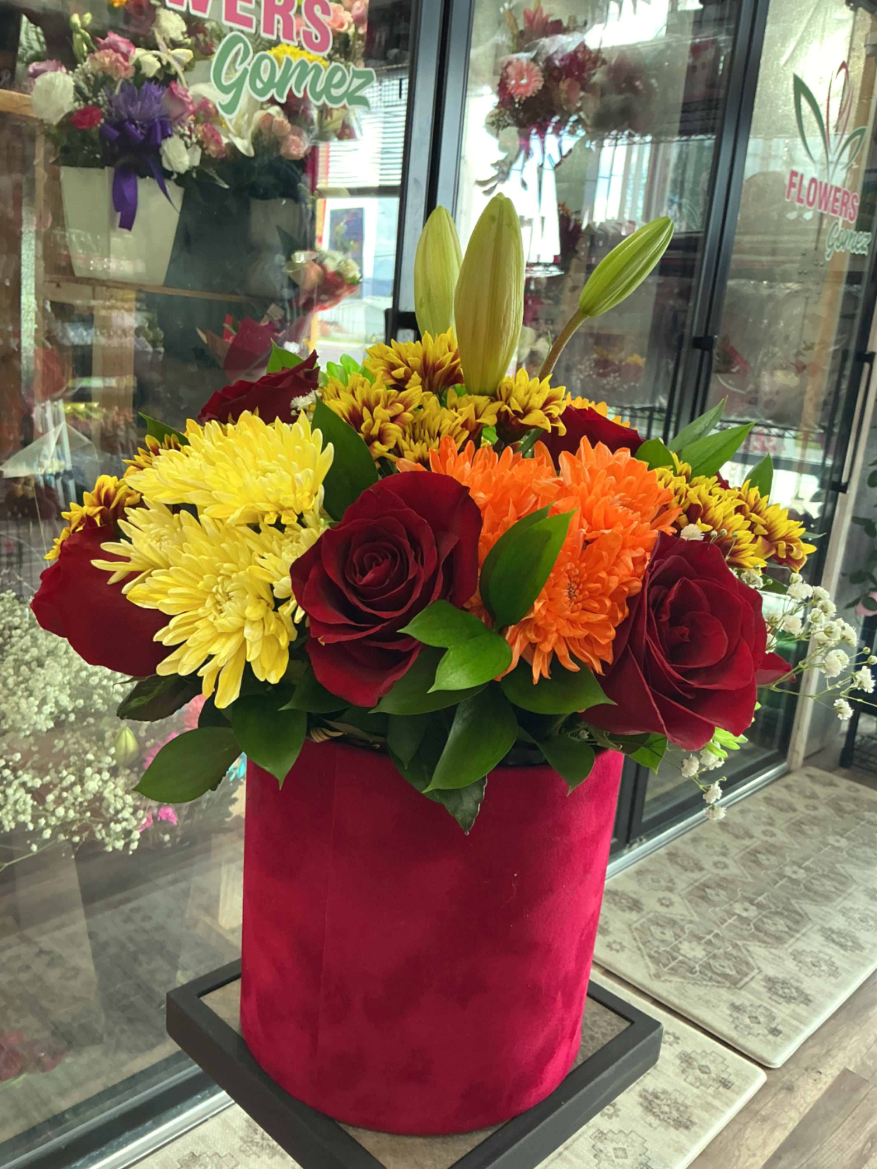 Red passion - This incredible arrangment is pure love made of red roses,lilies,baby breath and much more ,giving your love one such a marvelous experience .