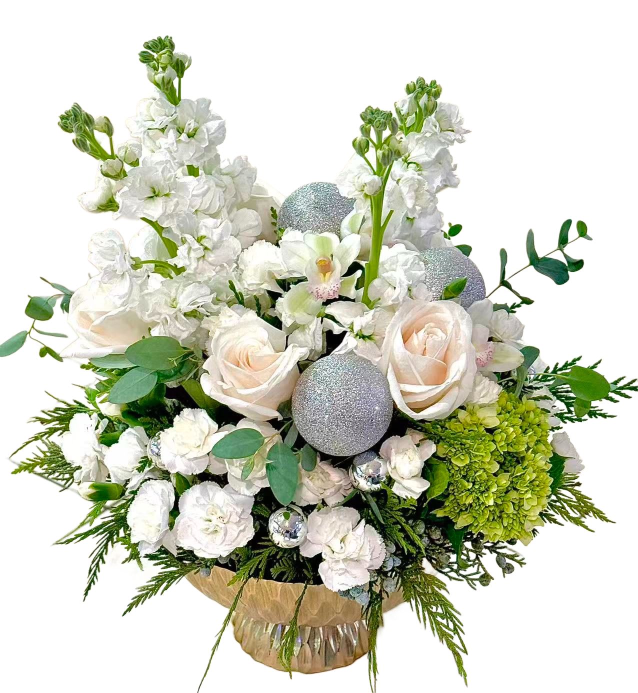 White floral arrangement with roses, orchids, and silver ornaments in a vase