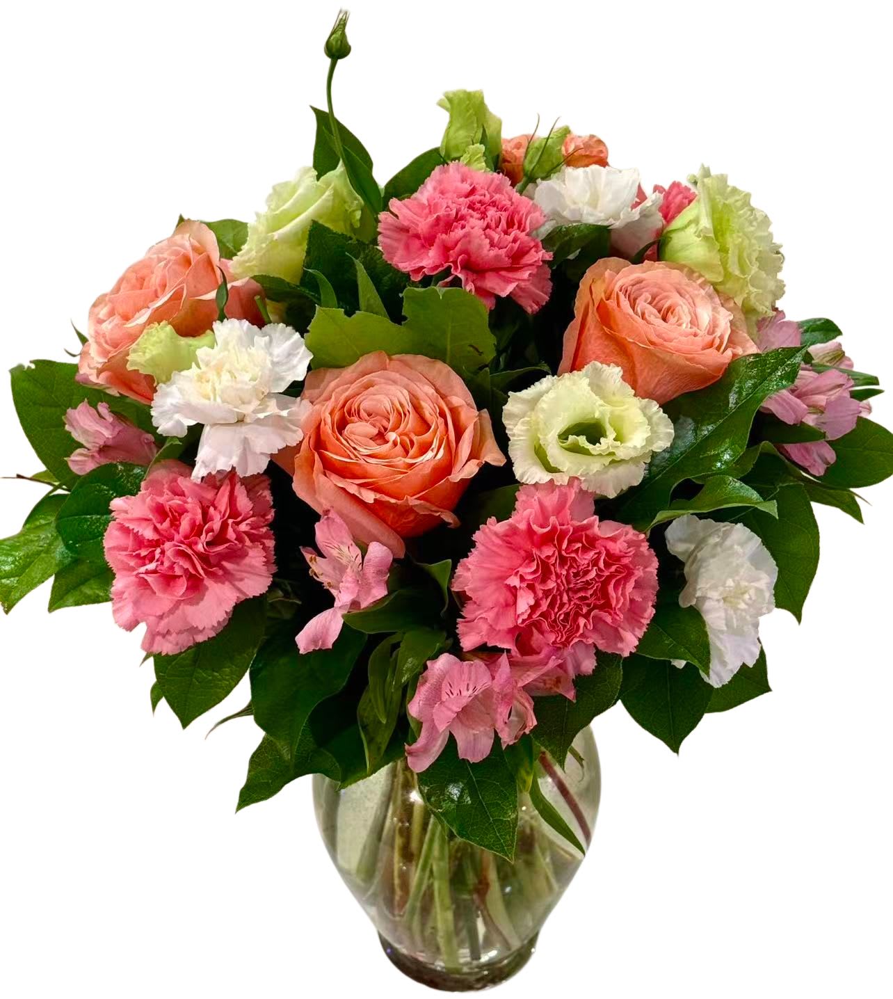 Pink and peach bouquet in a glass vase