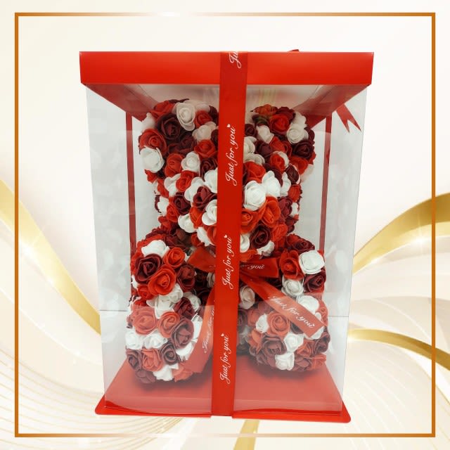 Heart-shaped rose teddy bear in a red gift box