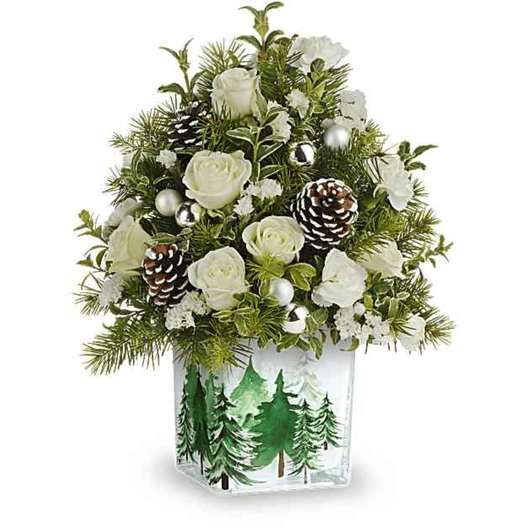 White roses and pinecones in a painted glass vase