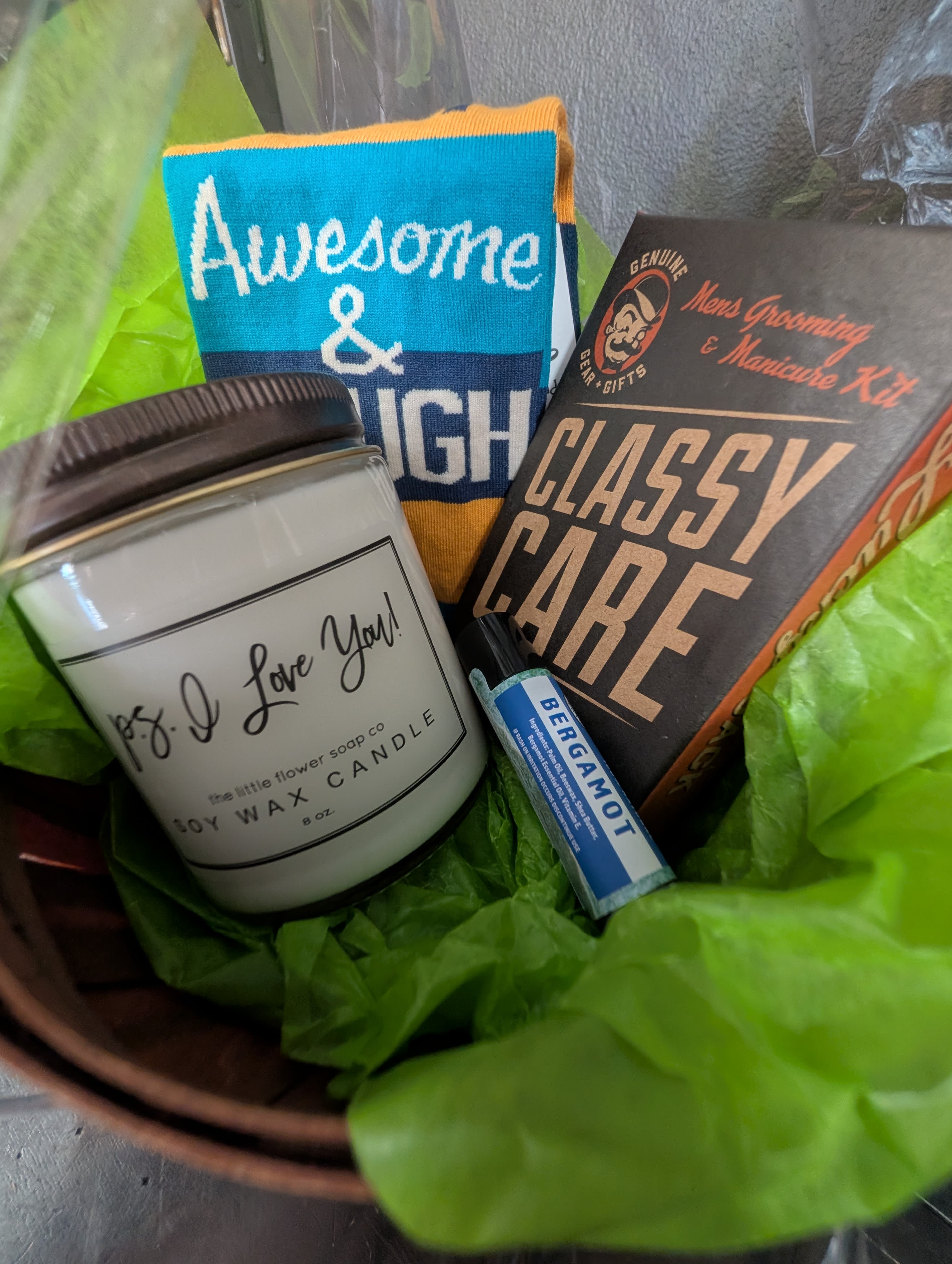 Men's Gift Basket - A gift basket with the man in your life in mind! Socks, candles, chapstick, and a manicure kit.