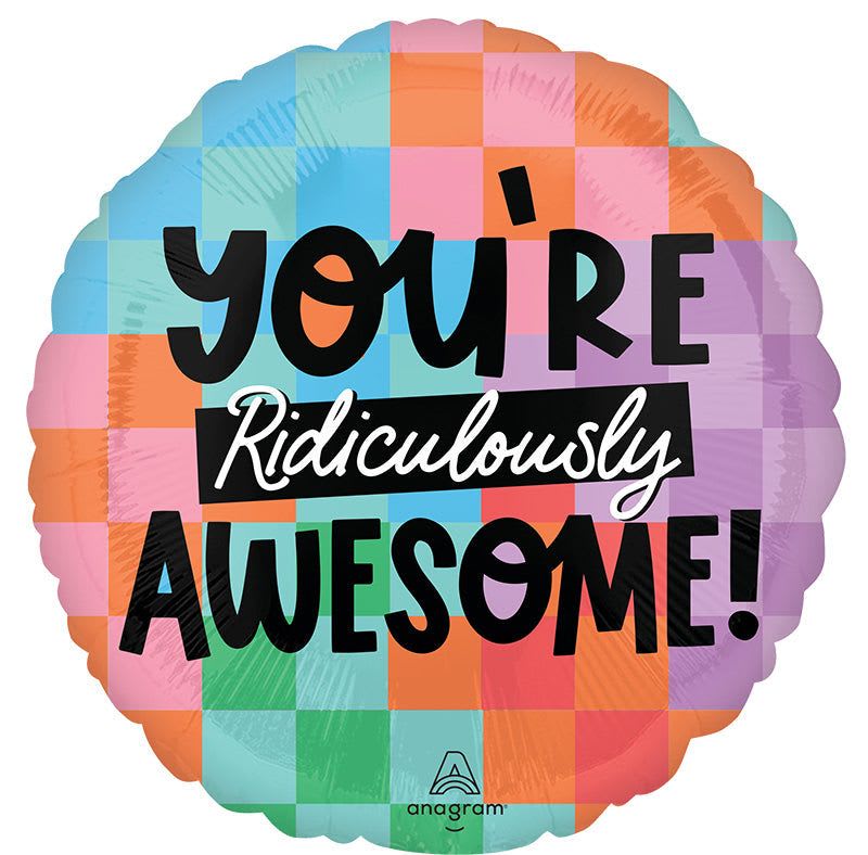 18" You're Ridiculously Awesome Mylar - A playful, celebratory foil balloon that says "You're Ridiculously Awesome!" is the perfect pick-me-up gift or party accent for birthdays, congratulations, or just-because moments. This 18" round Mylar balloon features a pastel checkerboard of pink, orange, blue, green and purple with bold black lettering and a white script across the center-an upbeat, colorful focal piece that instantly reads as joyful and fun for the person you're celebrating.  Lightweight and ready to pair with bouquets, gift baskets, or as a stand-alone surprise, this mixed-color foil balloon adds instant whimsy to any table or room. Order it to mark graduations, work wins, anniversaries, or to make someone feel genuinely seen-its bright palette and cheerful message are made to put a smile on their face. (Balloon measures 18".)