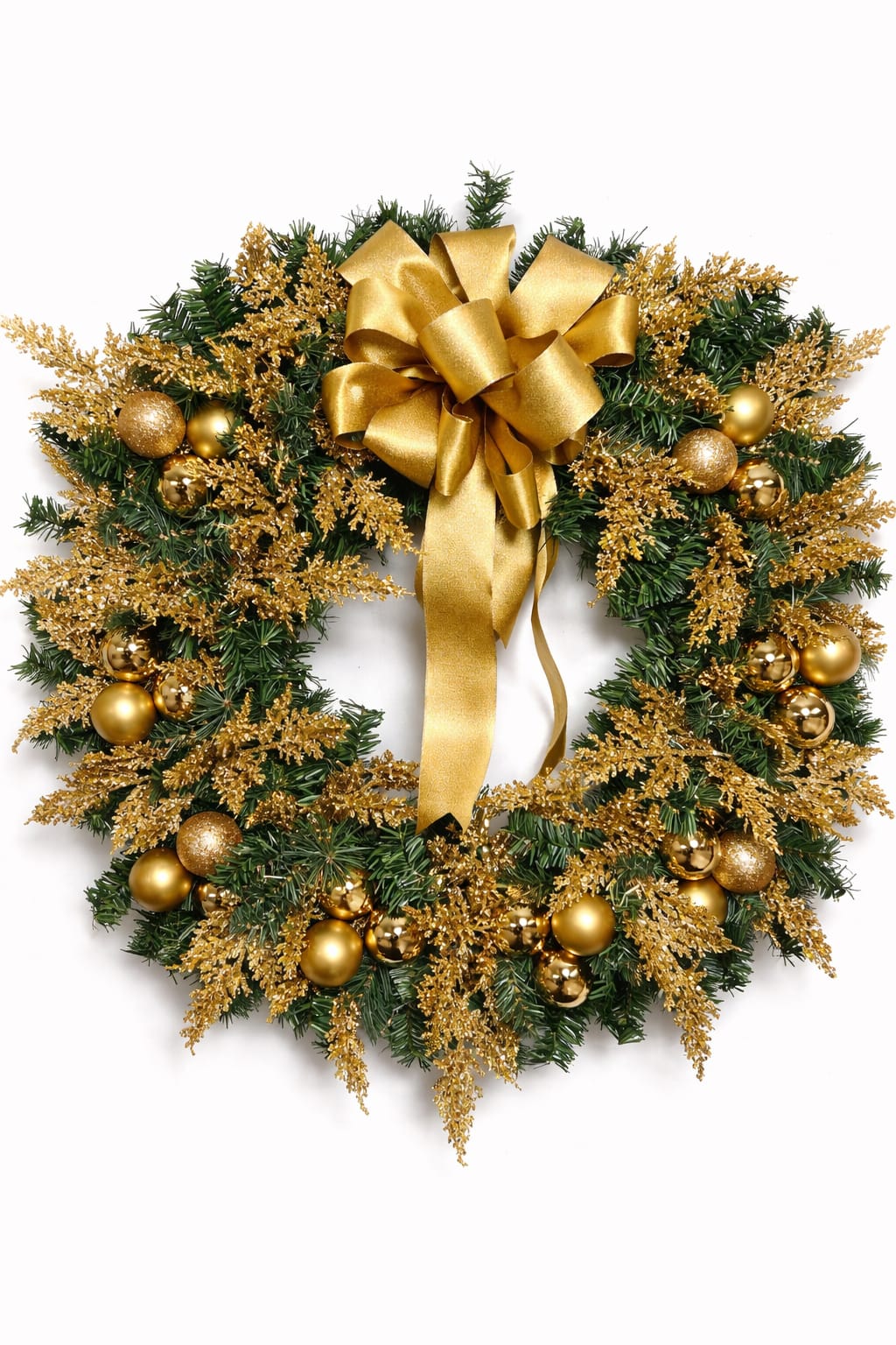 Luxury Christmas Glow Wreath - Celebrate the magic of the season with this luxurious holiday wreath, beautifully crafted with rich evergreen foliage, shimmering golden accents, and elegant ornaments. Finished with a stunning oversized satin bow, this design radiates warmth, sophistication, and festive charm.  The deep greens symbolize life and renewal, while the golden details add a touch of celebration, abundance, and timeless elegance. Perfect for front doors, entryways, or interior décor, this wreath instantly transforms any space into a welcoming holiday statement.  Classic, radiant, and unforgettable—this is more than décor, it’s a celebration of the season.