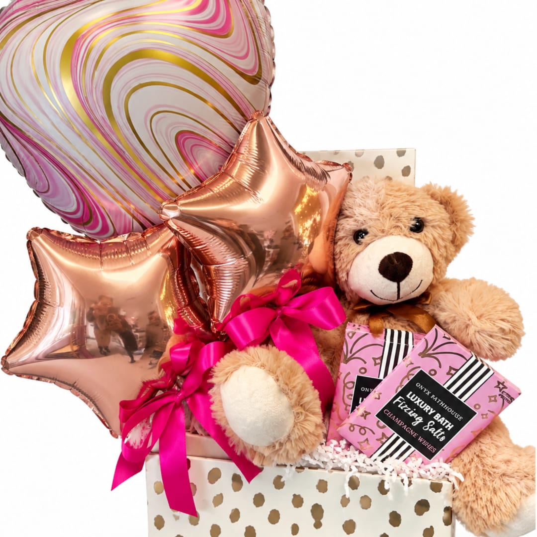 Gift basket with teddy bear, star balloons, and bath salts