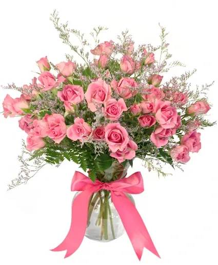 Adoring Sweetness Spray Rose Bouquet - This bouquet is a miniature version of traditional long-stem roses featuring pink spray roses Available in three sizes Spray roses can be available in red, lavender, yellow, orange, hot pink, light pink, white &amp; green. Please indicate your preference for color(s) If you are ordering for same or next day delivery please also note alternate choice of color(s)  Includes: Ginger Vase, Leather Leaf, Variegated Mini Pittosporum, Pink Limonium, Pink Spray Roses, Pink Ribbon.
